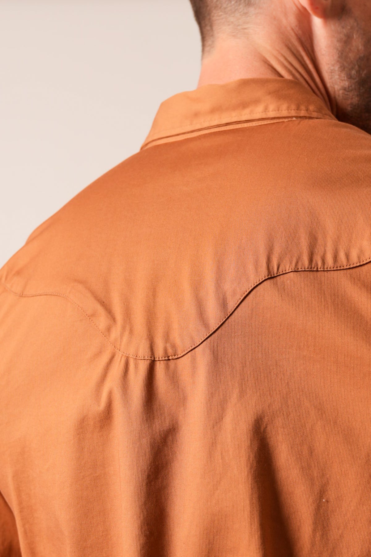 Kimes Ranch Baffert dress shirt in Work Wear Brown, back view with yoke and collar