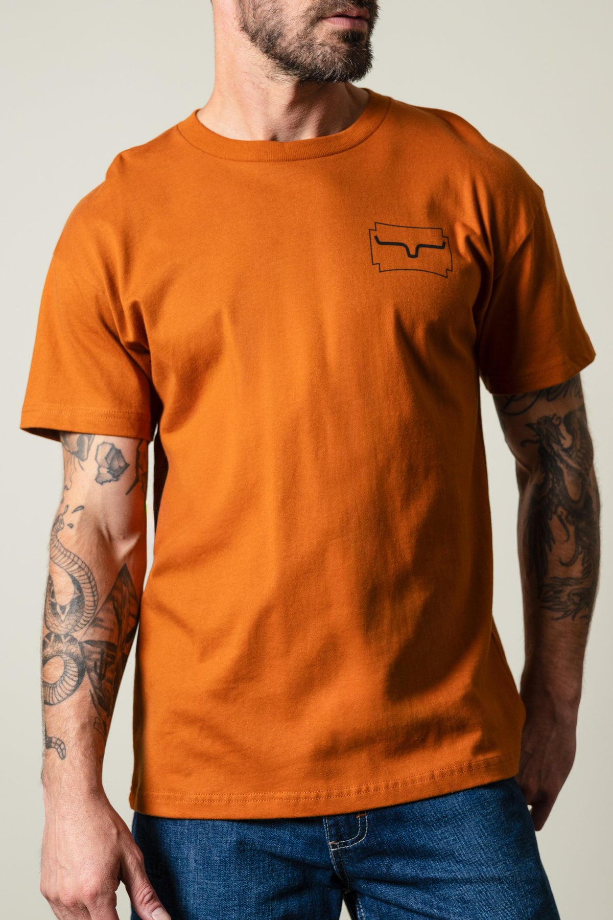 Kimes Ranch Clay Camo Crest short sleeve t-shirt with a black logo on the left chest; #color_clay