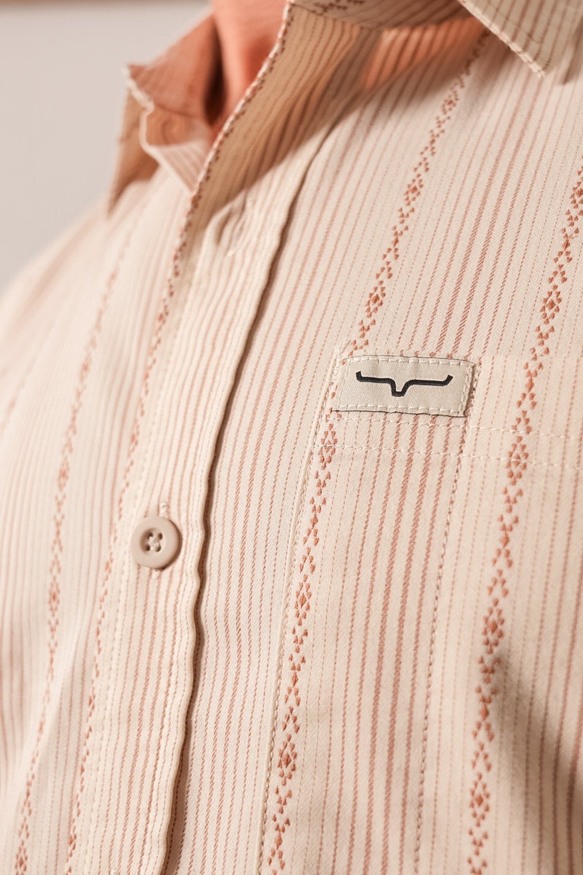 Kimes Ranch Dash dress shirt in Natural with vertical stripes and Kimes Ranch logo patch on chest pocket