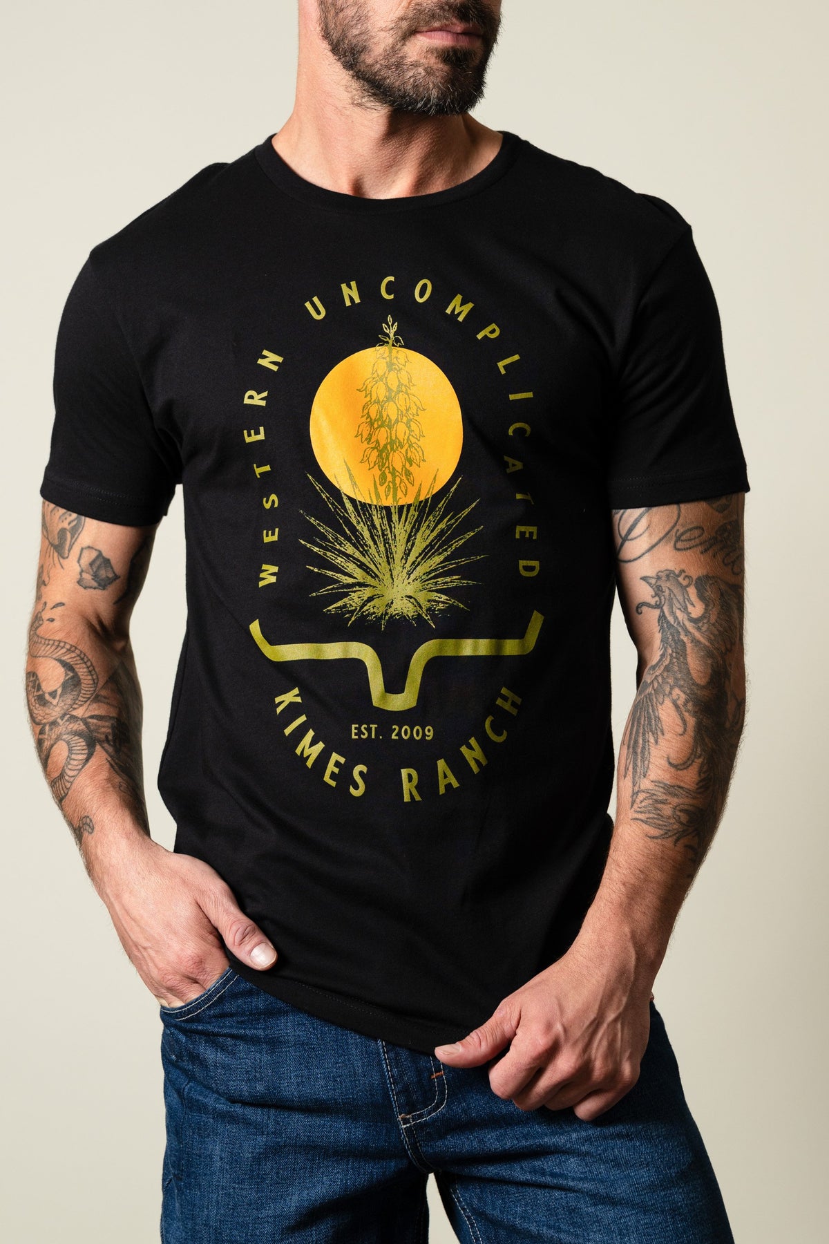 Kimes Ranch Drought Resistant black shirt with graphic of yucca and text reading 'WESTERN UNCOMPLICATED KIMES RANCH; #color_black