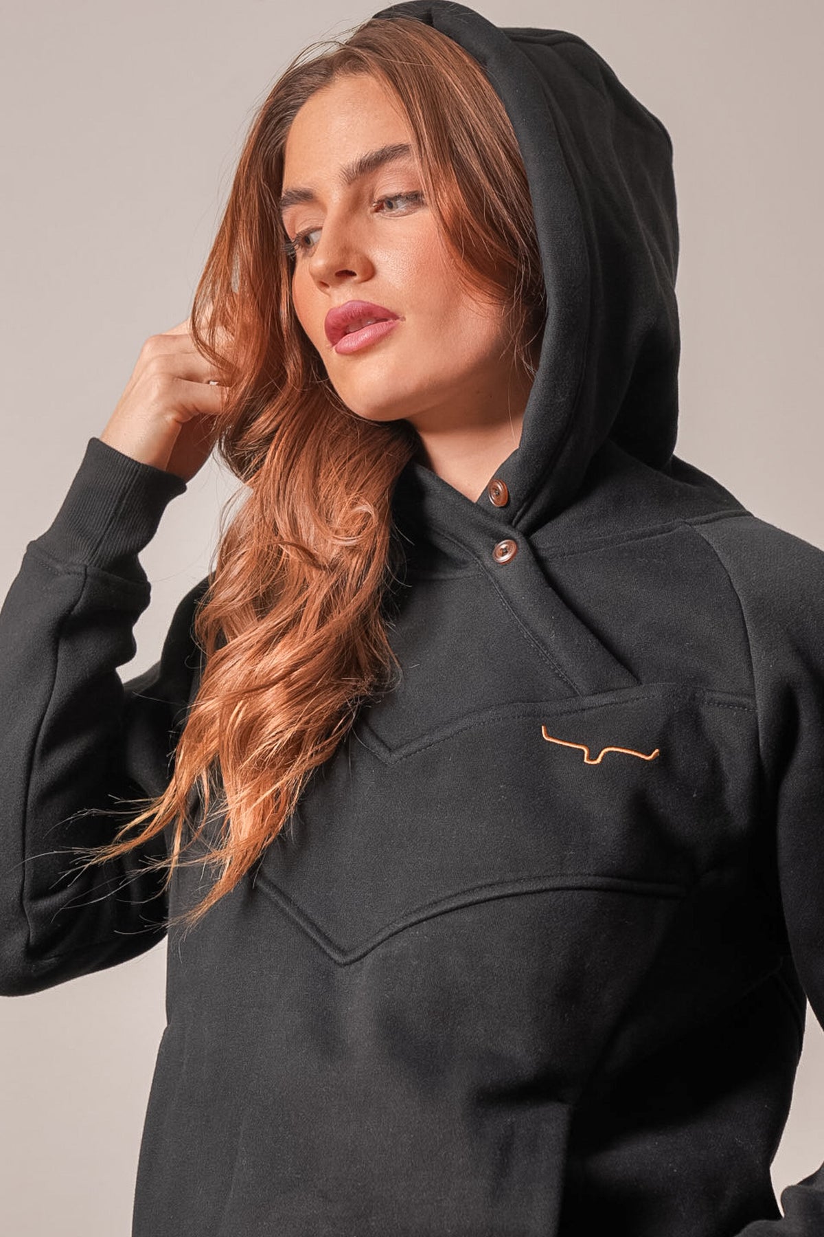 Kimes Ranch Ella hoodie in black featuring long sleeves, kangaroo pocket, snap placket and logo embroidery