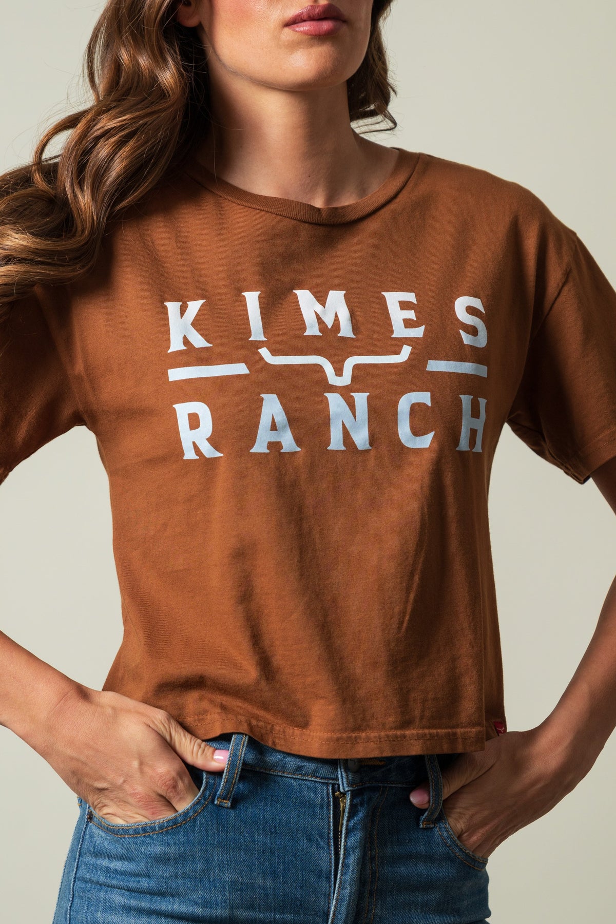 Kimes Ranch Faded Brand short sleeve crewneck shirt in brown featuring white KIMES RANCH logo text and graphic; #color_brown