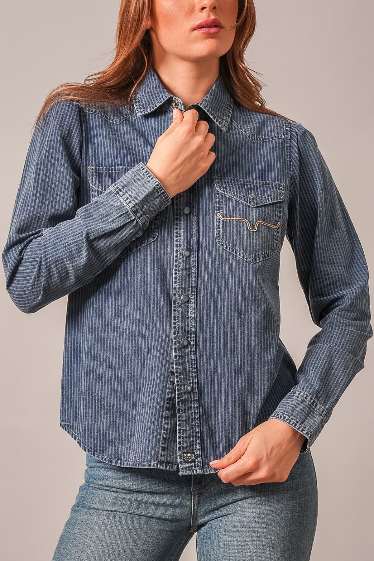 Kimes Ranch Frankie top in Indigo Stripe with long sleeves, button-front, western yoke and front pockets