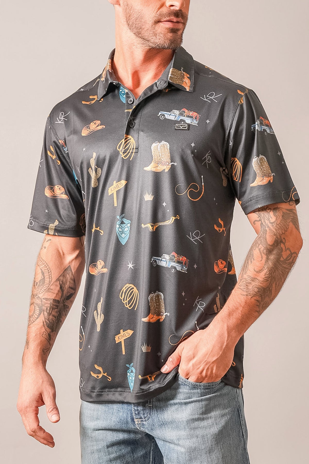 Kimes Ranch Hickman polo in Black with an all-over print of cowboy boots, trucks, and horseshoes