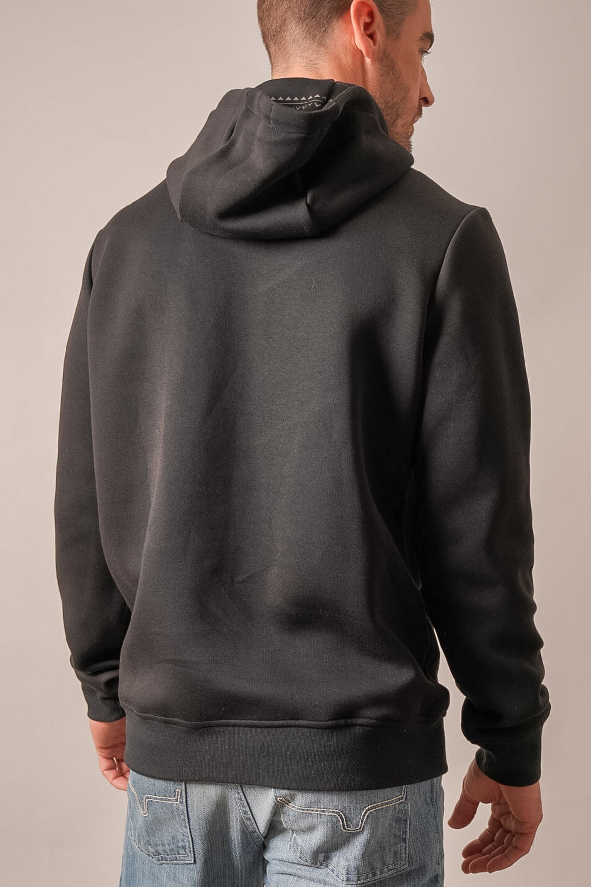Kimes Ranch Inman hoodie, black, showing back view with hood and ribbed hem