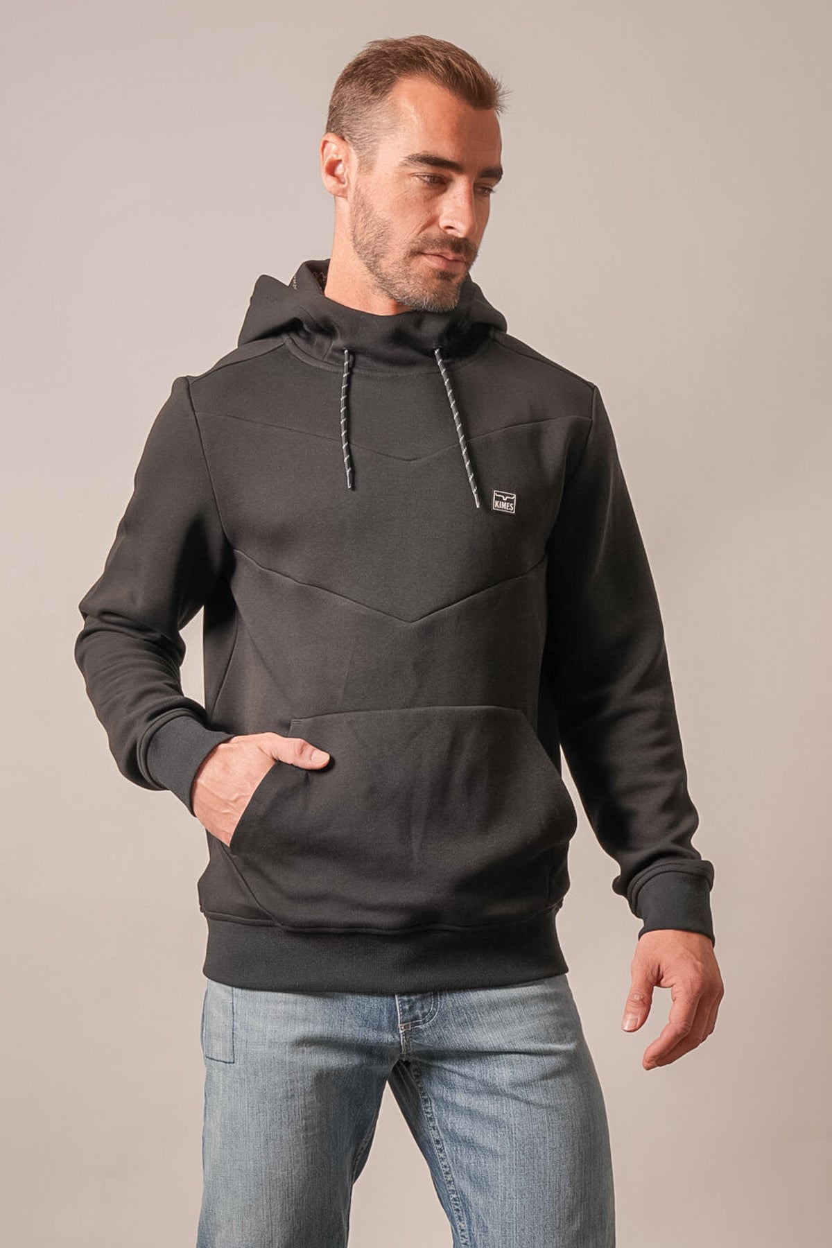 Kimes Ranch Inman black hoodie with raglan sleeves, front kangaroo pocket, and Kimes Ranch logo on chest