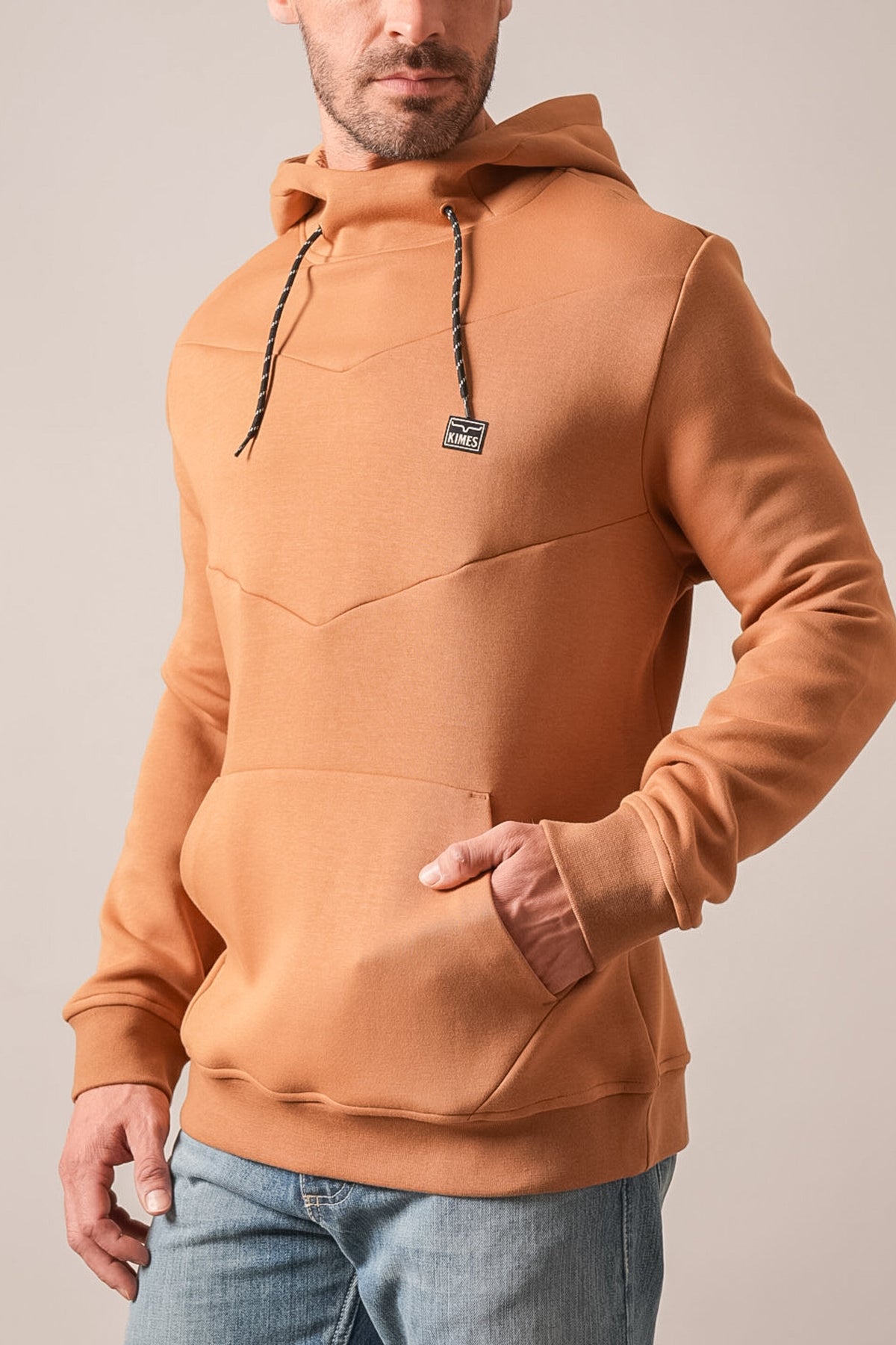 Kimes Ranch Inman Work Wear Brown hoodie featuring a front kangaroo pocket and the Kimes Ranch logo on the chest