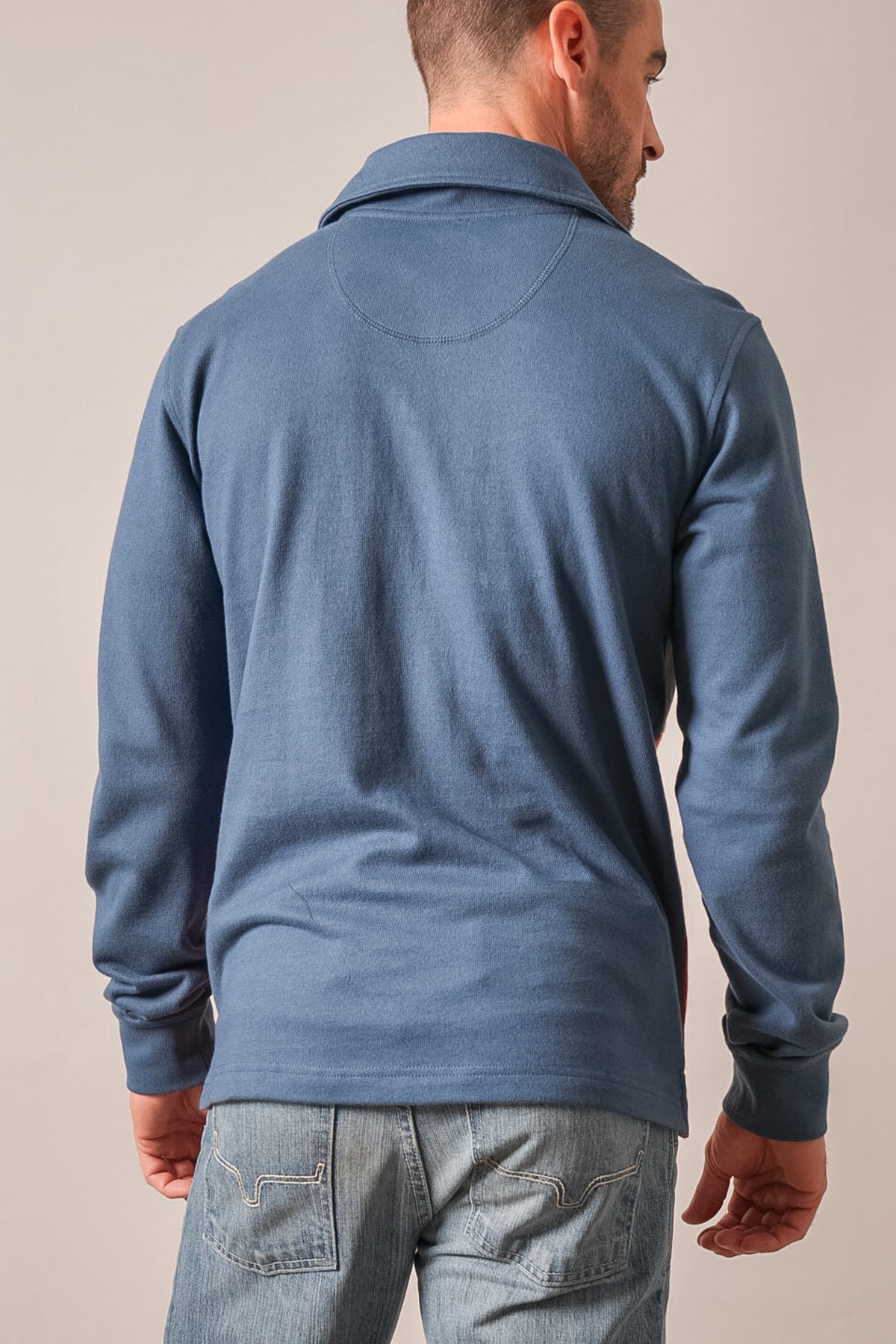 Kimes Ranch Lark long sleeve polo shirt back view in dark blue with ribbed collar and cuffs