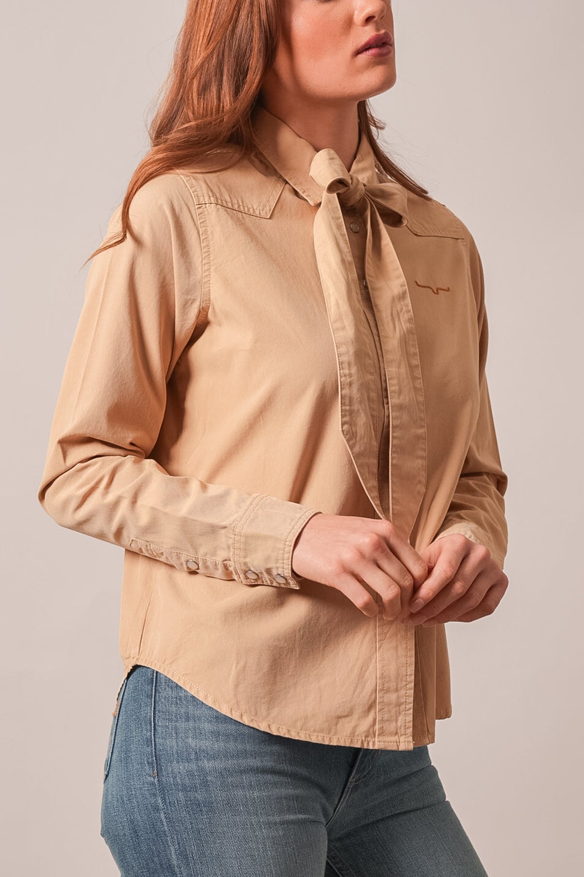 Kimes Ranch Lolo long sleeve sand top, tie neck, pointed yoke, embroidered Kimes Ranch logo on chest