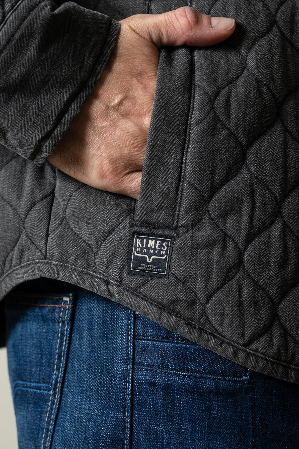 Kimes Ranch Madison jacket in black with herringbone pattern and diamond quilting featuring Kimes Ranch logo patch