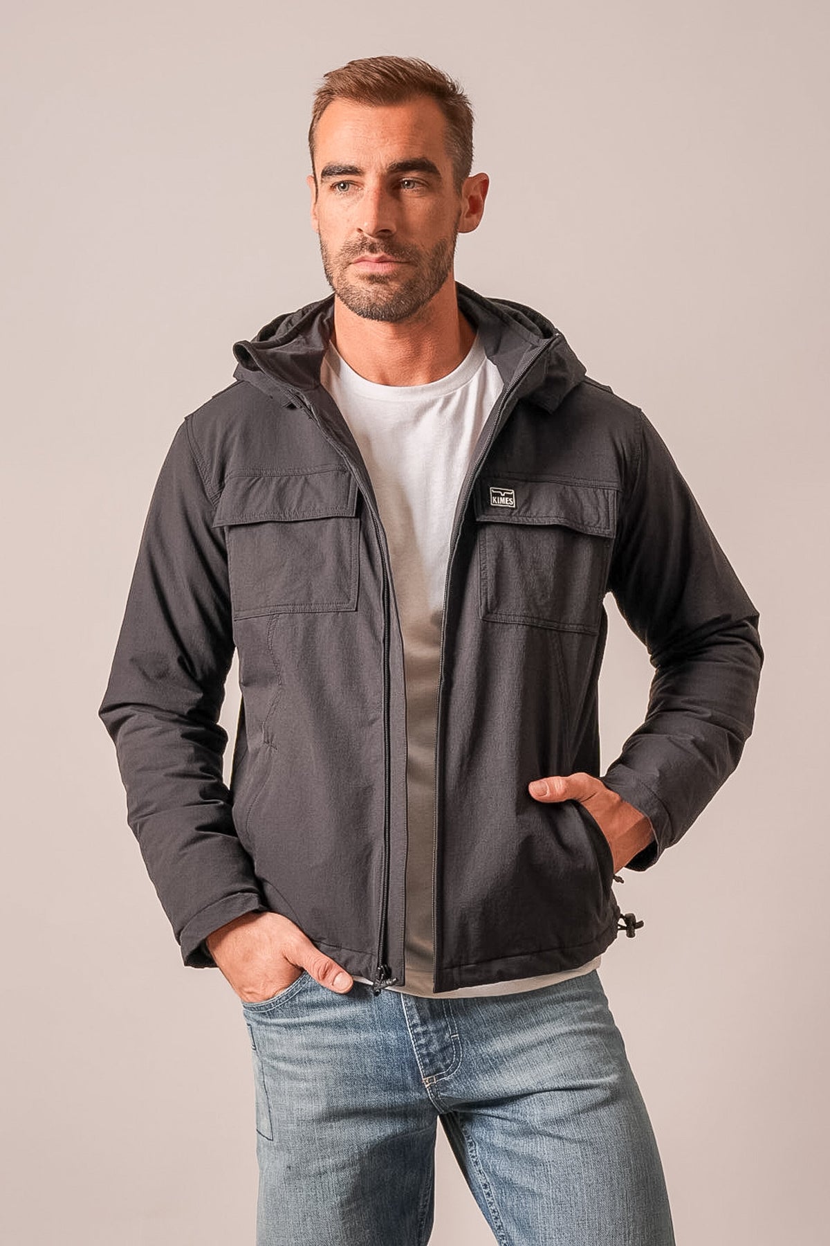 Kimes Ranch Mayfair jacket in black with zip front, hood, and flap pockets
