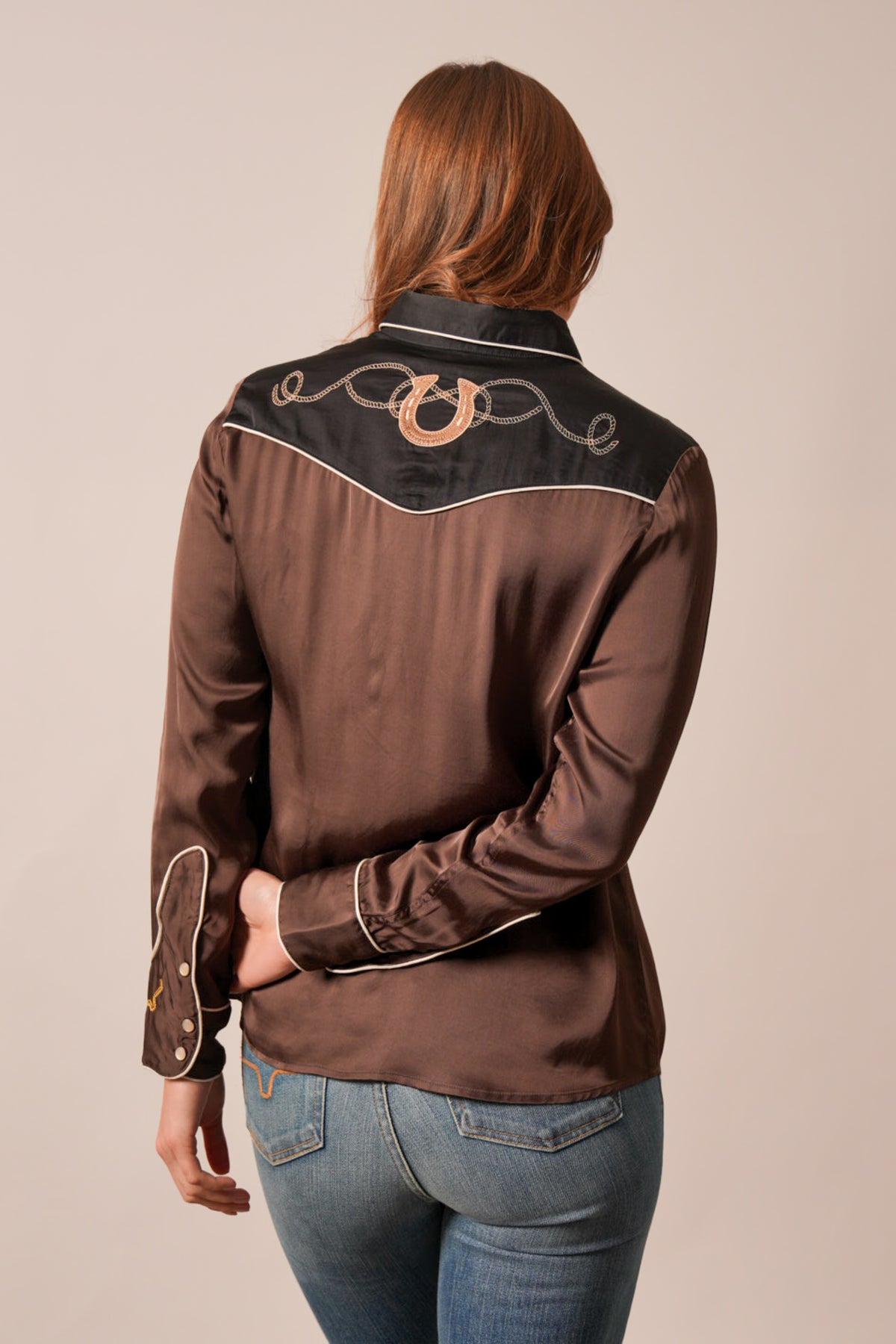 Kimes Ranch Merada long sleeve satin top in black with horseshoe embroidery on yoke