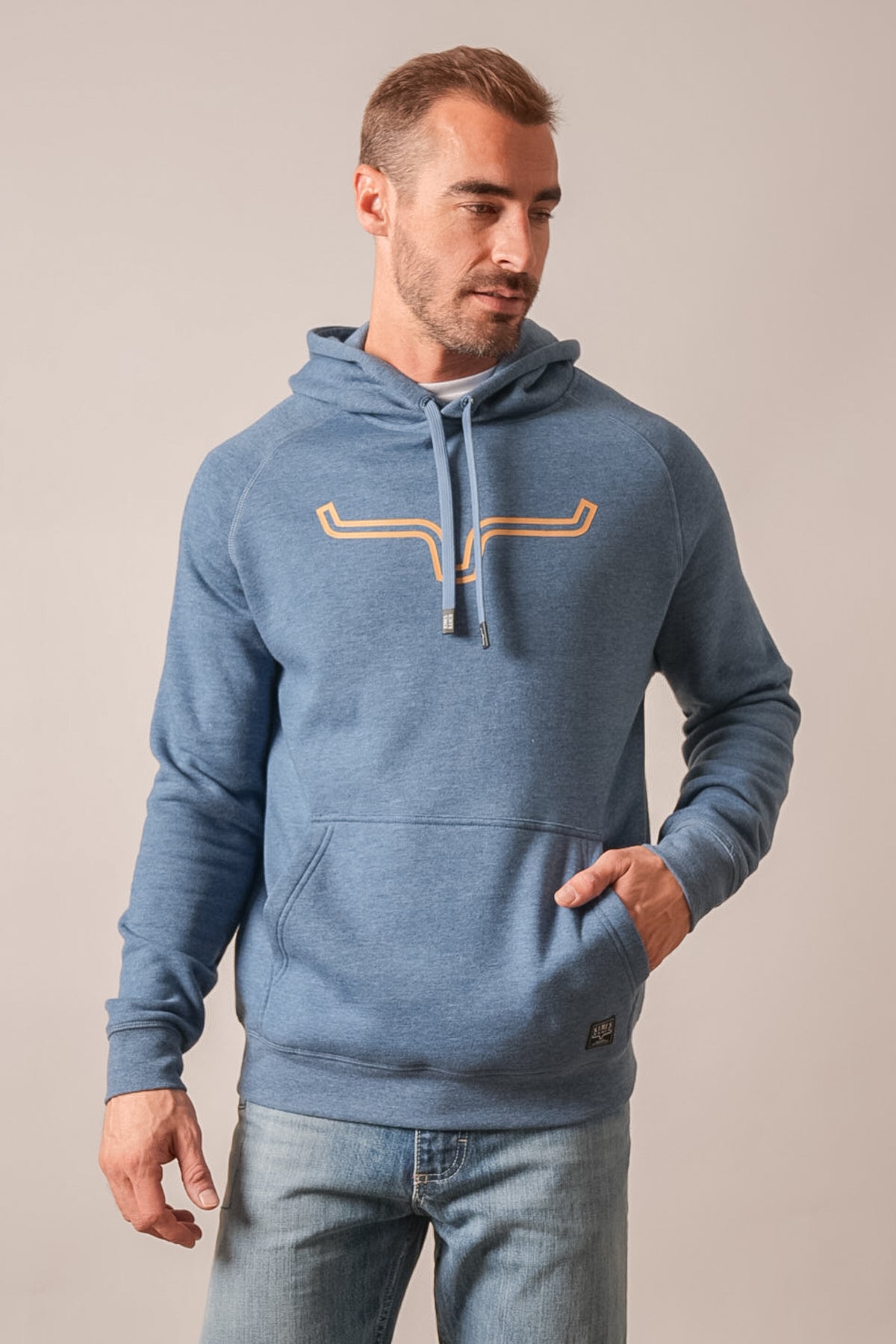 Kimes Ranch Outlier hoodie in navy heather with long sleeves, kangaroo pocket, and yellow Kimes Ranch logo