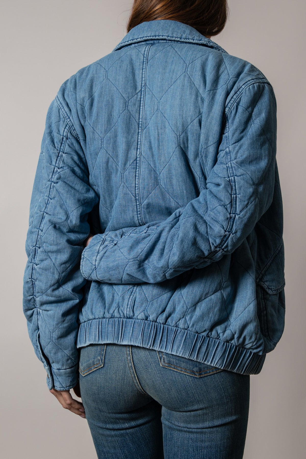 Kimes Ranch Phoeby indigo denim jacket with diamond quilting, long sleeves, and elastic hem
