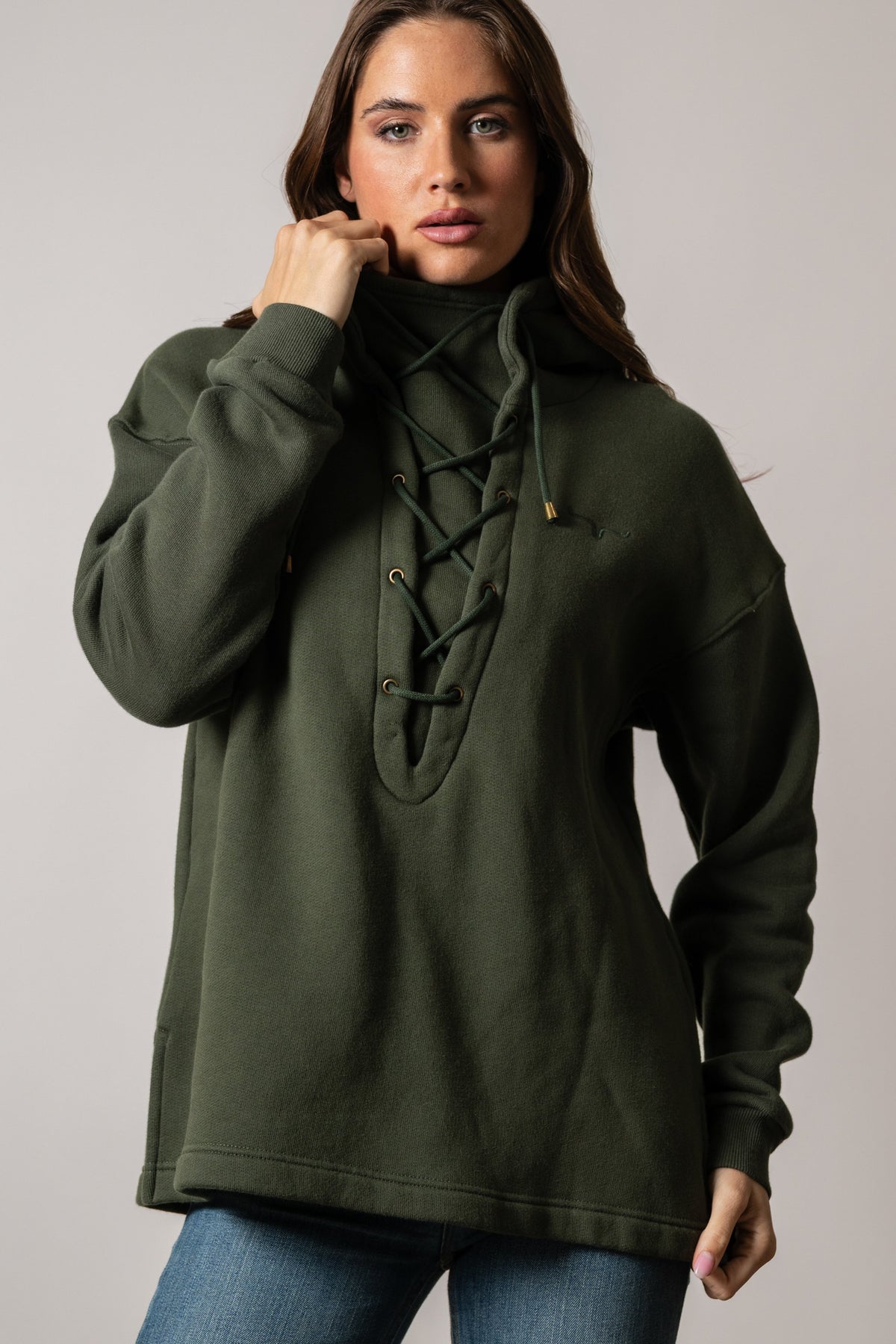 Kimes Ranch Pippi Hoodie in Dark Olive with front lace-up detail and long sleeves