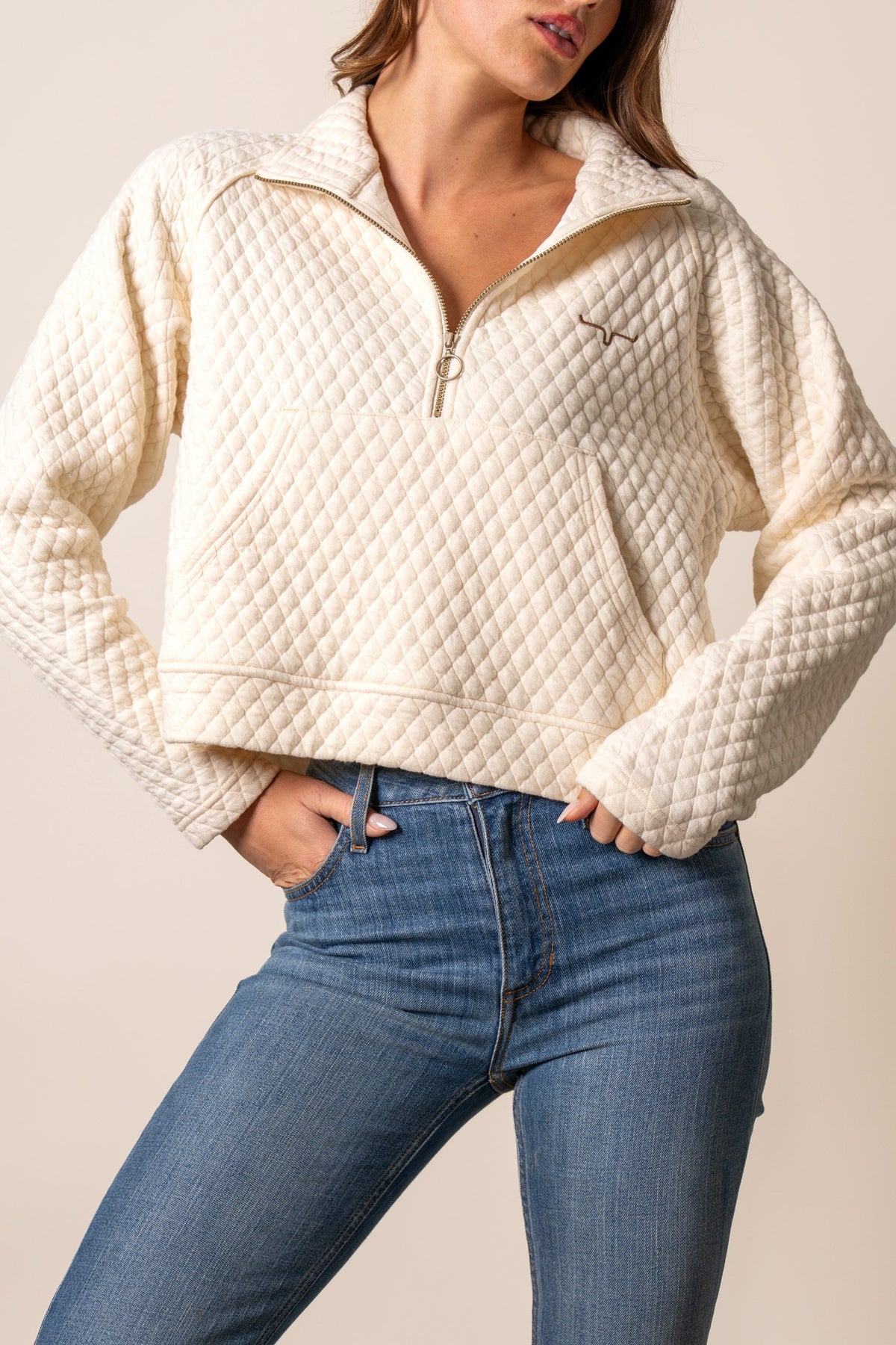 Kimes Ranch Rita sweatshirt in Natural with a diamond quilted pattern and a half-zip front with a kangaroo pocket
