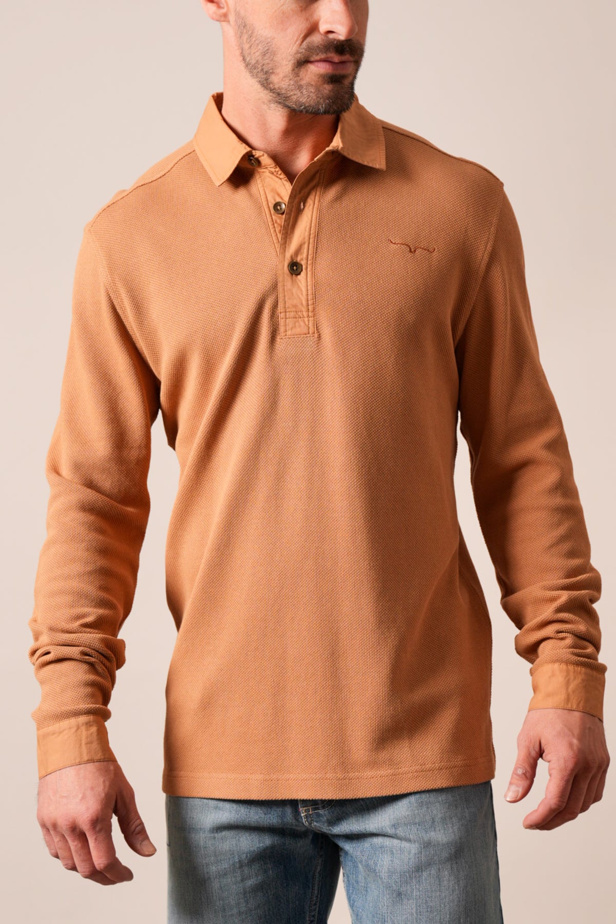 Kimes Ranch Rockaway long sleeve polo shirt in Work Wear Brown featuring a button placket and embroidered logo