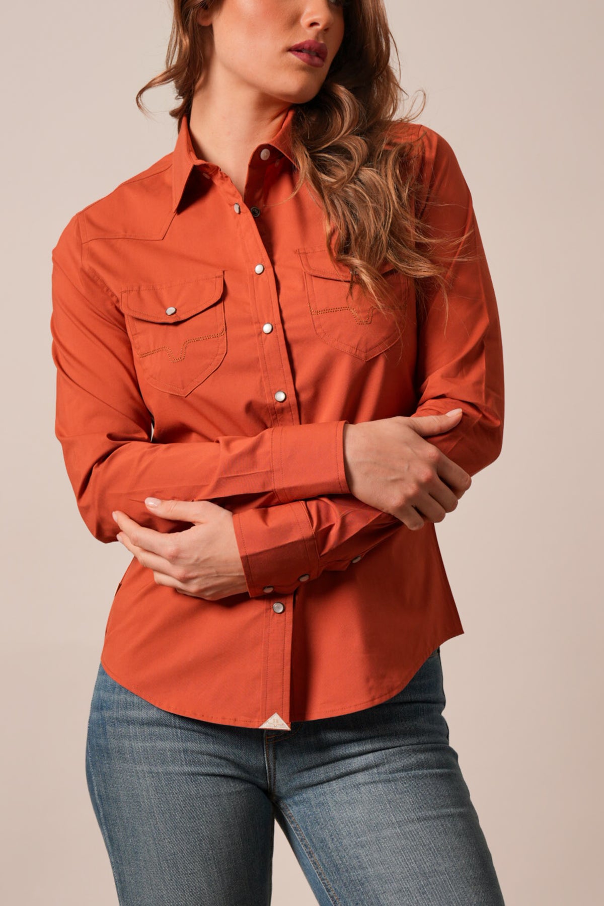 Kimes Ranch Skeeter long sleeve button-down top in Burnt Red with Western yoke, two chest pockets, and contrasting stitching