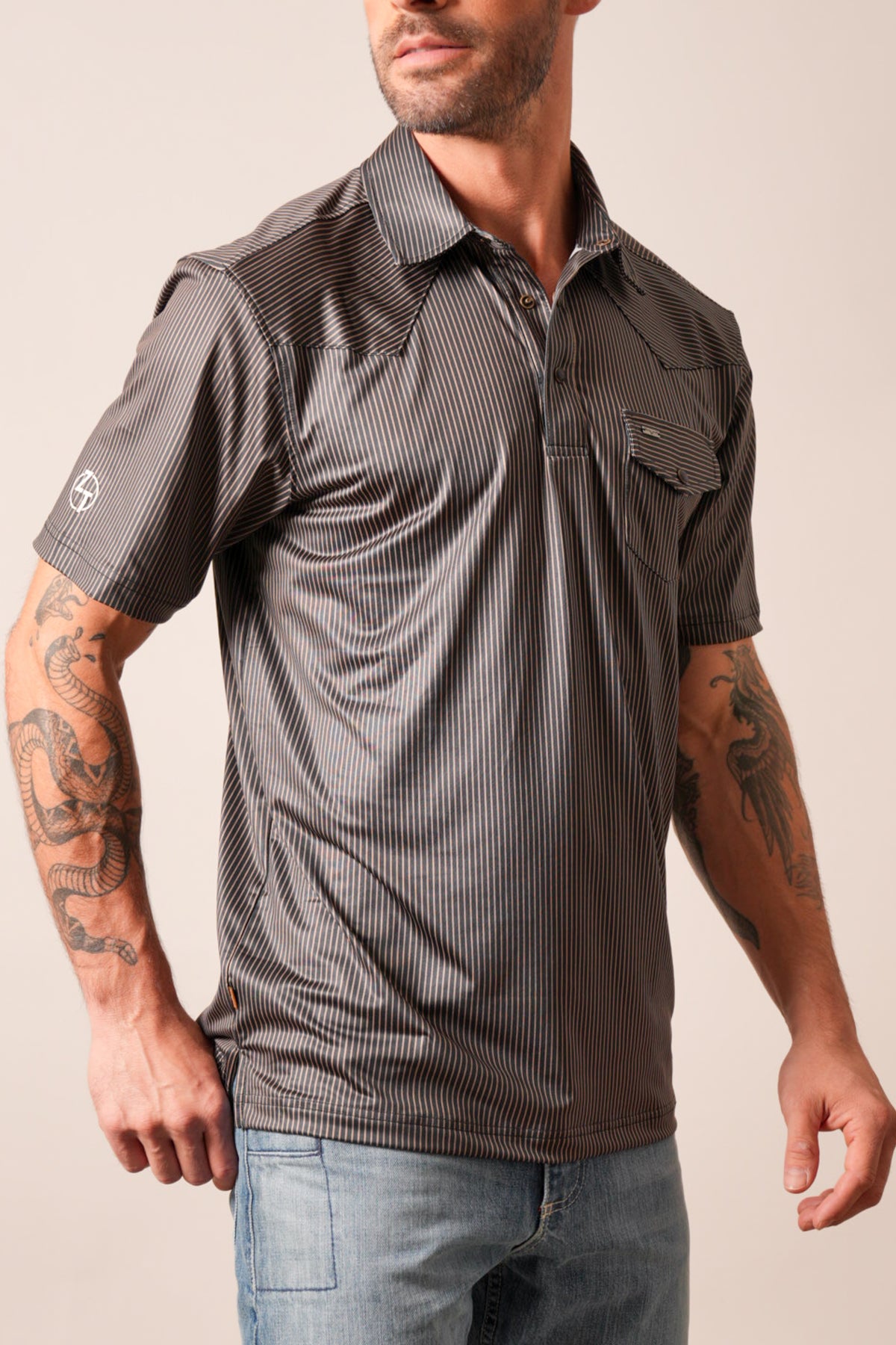 Kimes Ranch ZT Loomis black striped polo with short sleeves, chest pocket and logo on sleeve