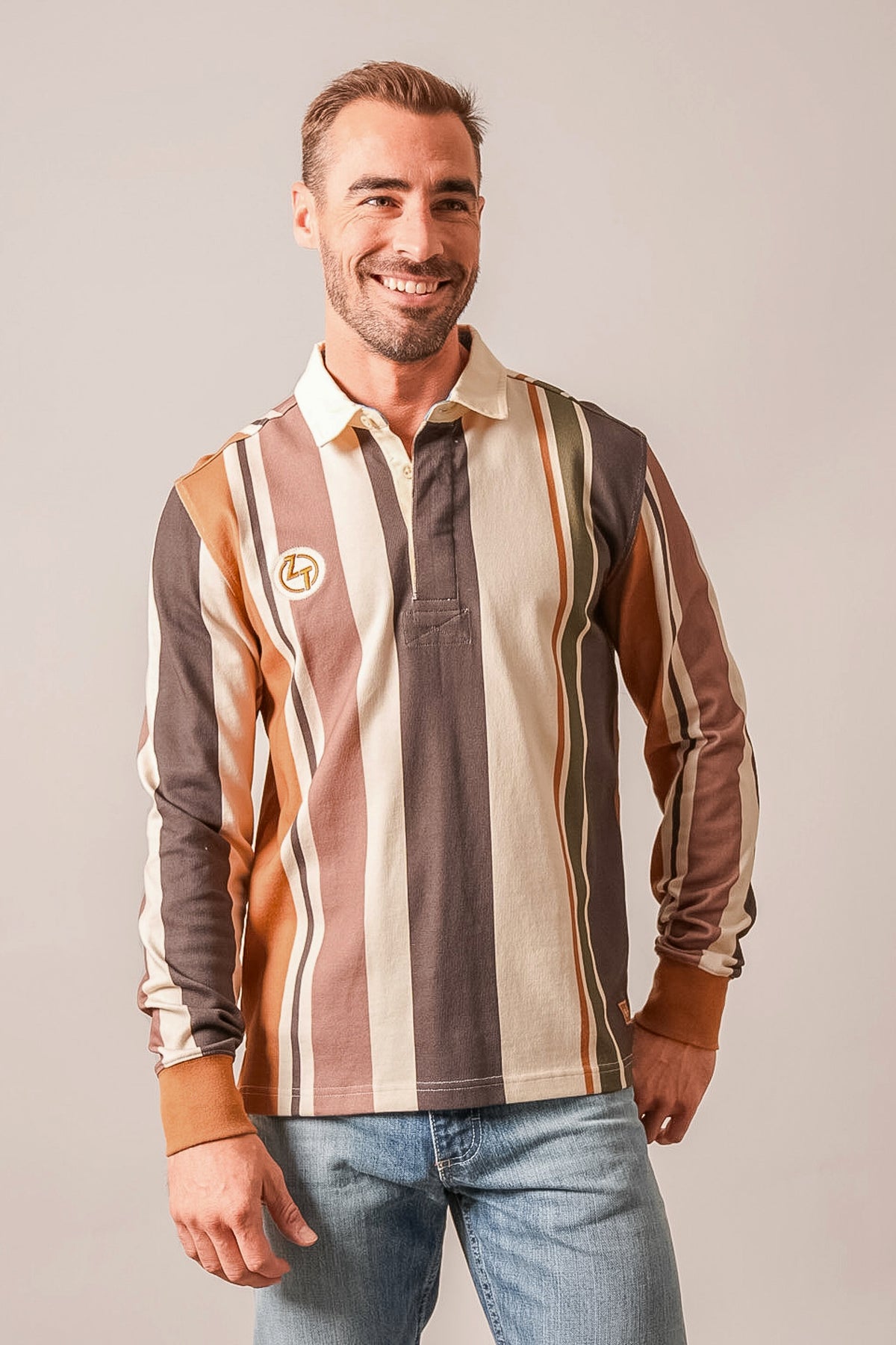Kimes Ranch ZT Wyatt long sleeve polo shirt in Espresso with vertical stripes and a chest logo
