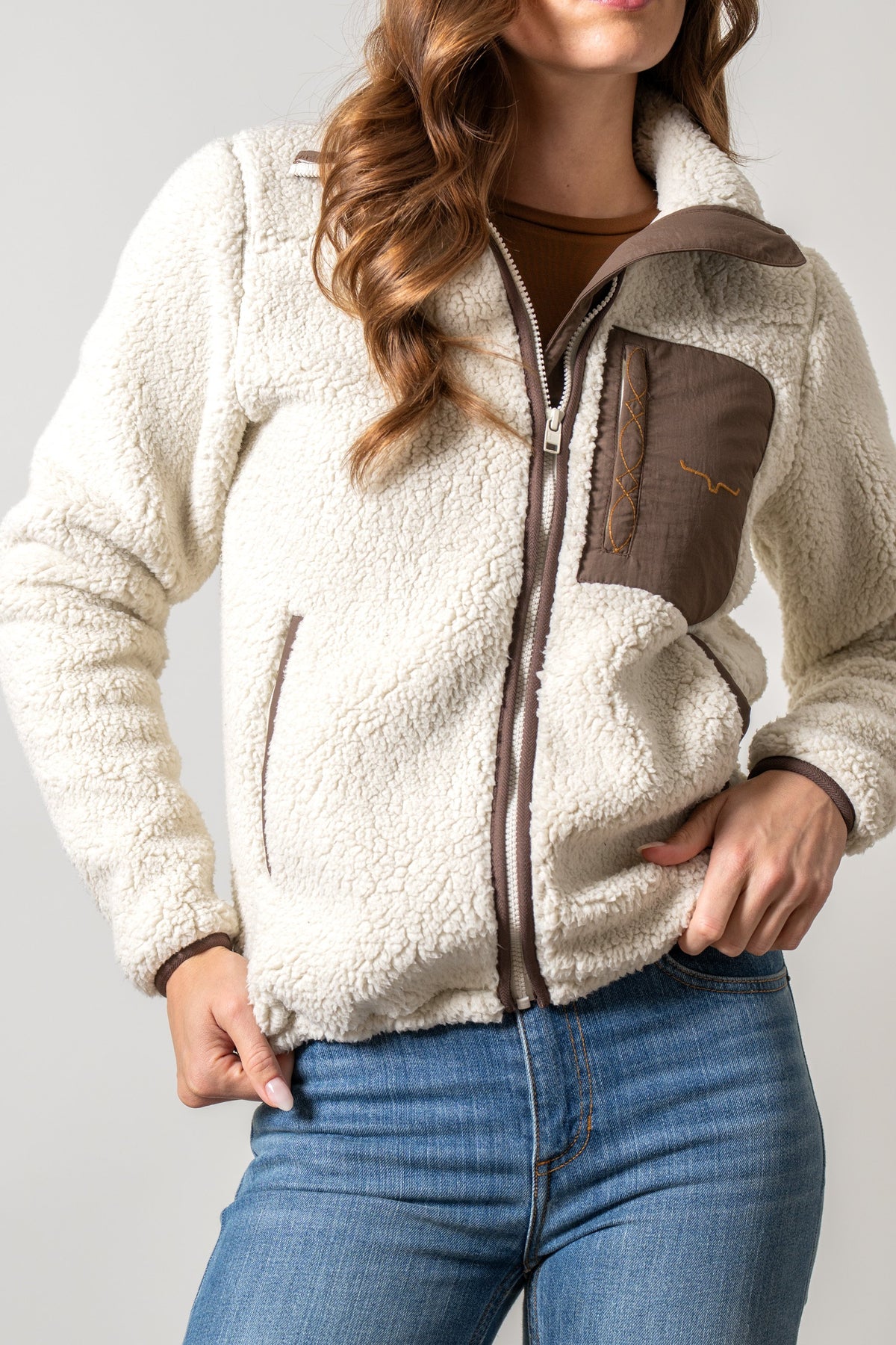 Kimes Ranch Arlee Natural Sherpa Sweatshirt with brown panel, Kimes Ranch logo, full zip and side pockets