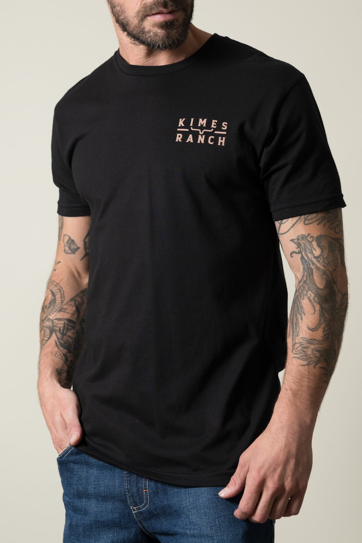Kimes Ranch Back Branded short sleeve t-shirt in black with a small logo graphic on the left chest area; #color_black