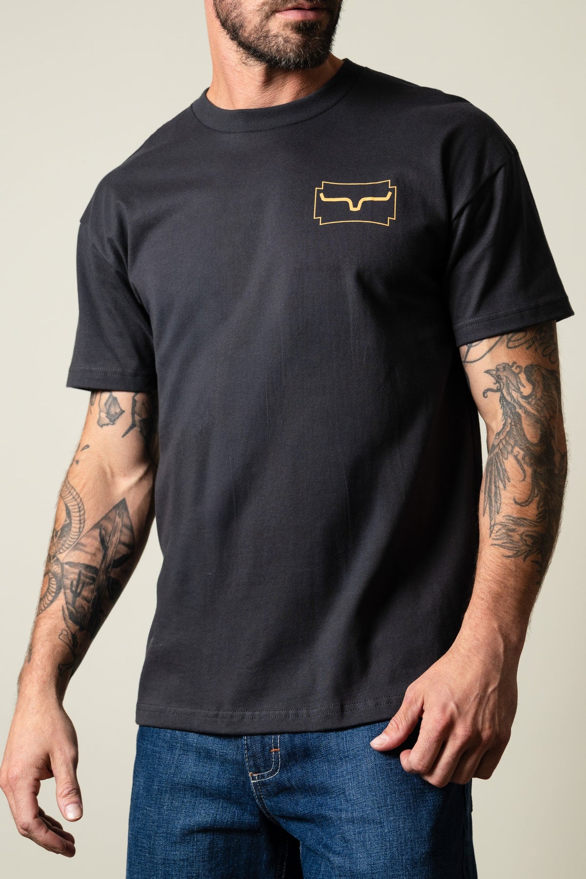 Kimes Ranch Camo Crest T-Shirt in Graphite Black with Kimes Ranch logo at chest; #color_graphite black
