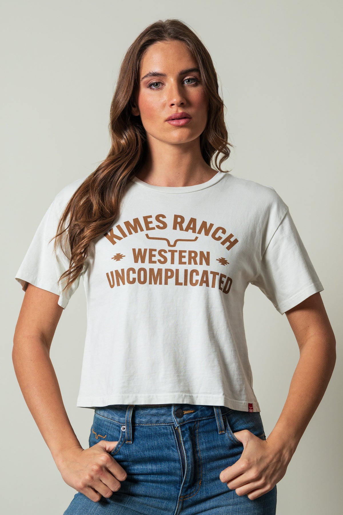 Kimes Ranch Cavell short sleeve shirt in Natural, featuring arched text KIMES RANCH WESTERN UNCOMPLICATED in brown; #color_natural