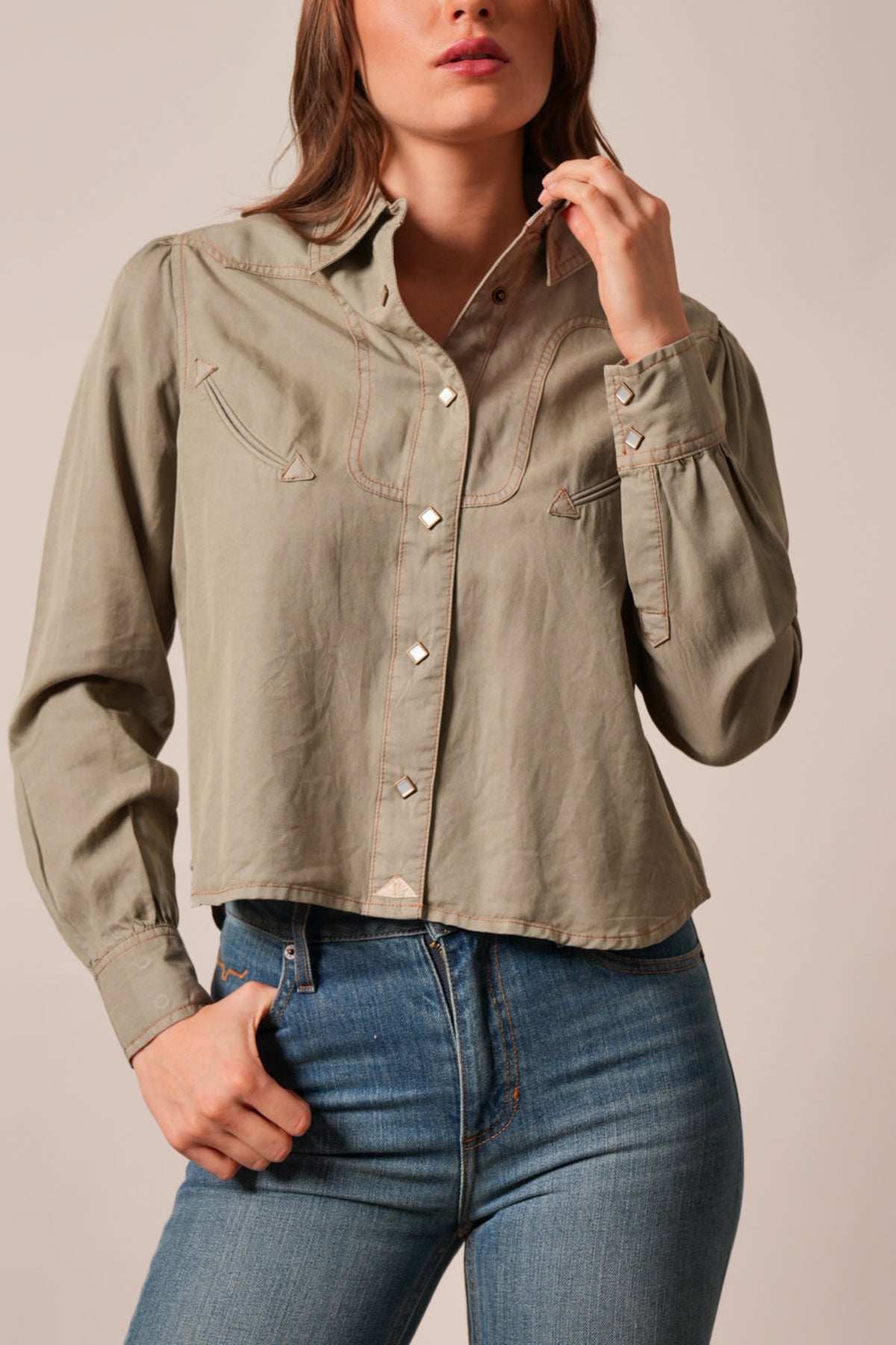 Kimes Ranch Cece top in moss with long sleeves, button front, and contrast stitching