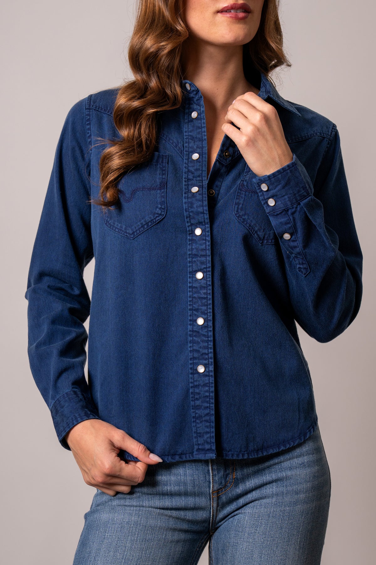 Kimes Ranch Della top in Dark Indigo, long sleeve western shirt with snap front and two front pockets