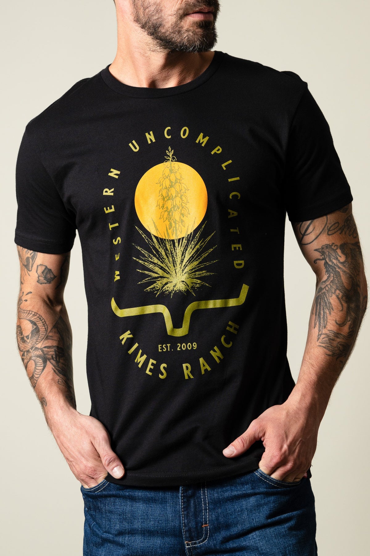 Kimes Ranch Drought Resistant shirt in black with yellow graphic, 'WESTERN UNCOMPLICATED', 'EST. 2009', and Kimes Ranch logo; #color_black