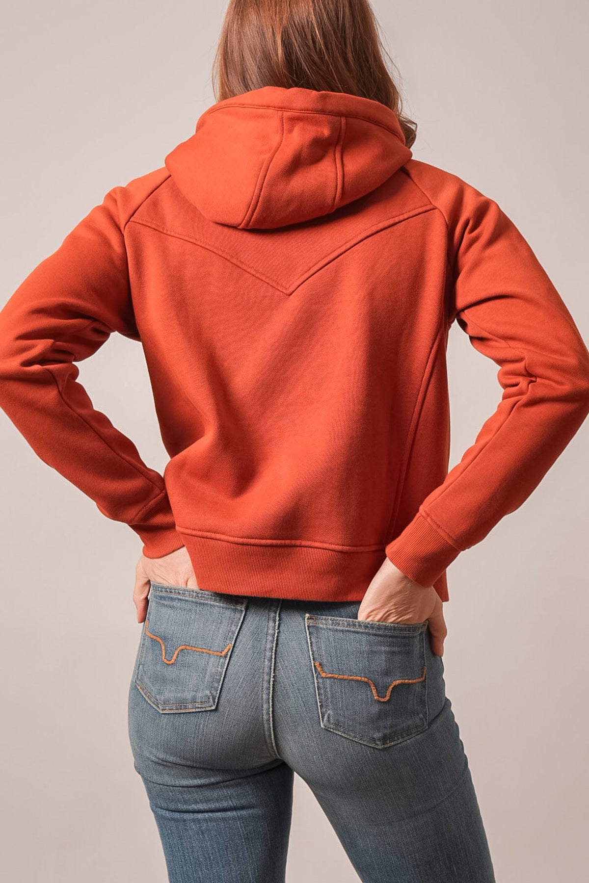 Kimes Ranch Ella hoodie in Burnt Red, back view, long sleeves, V-shaped yoke, and ribbed cuffs and hem