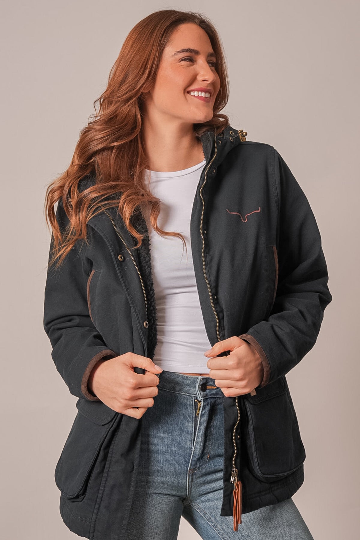 Kimes Ranch Emery black jacket with logo, sherpa lining, front zip, and two flap pockets