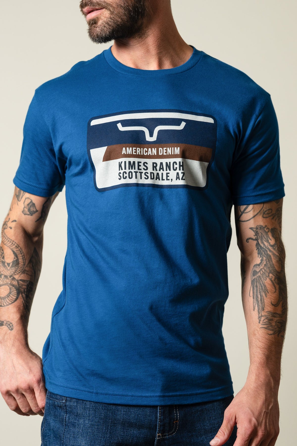 Kimes Ranch Feed Store Cool Blue short sleeve shirt with rectangular graphic showing Kimes Ranch Scottsdale, AZ; #color_cool blue