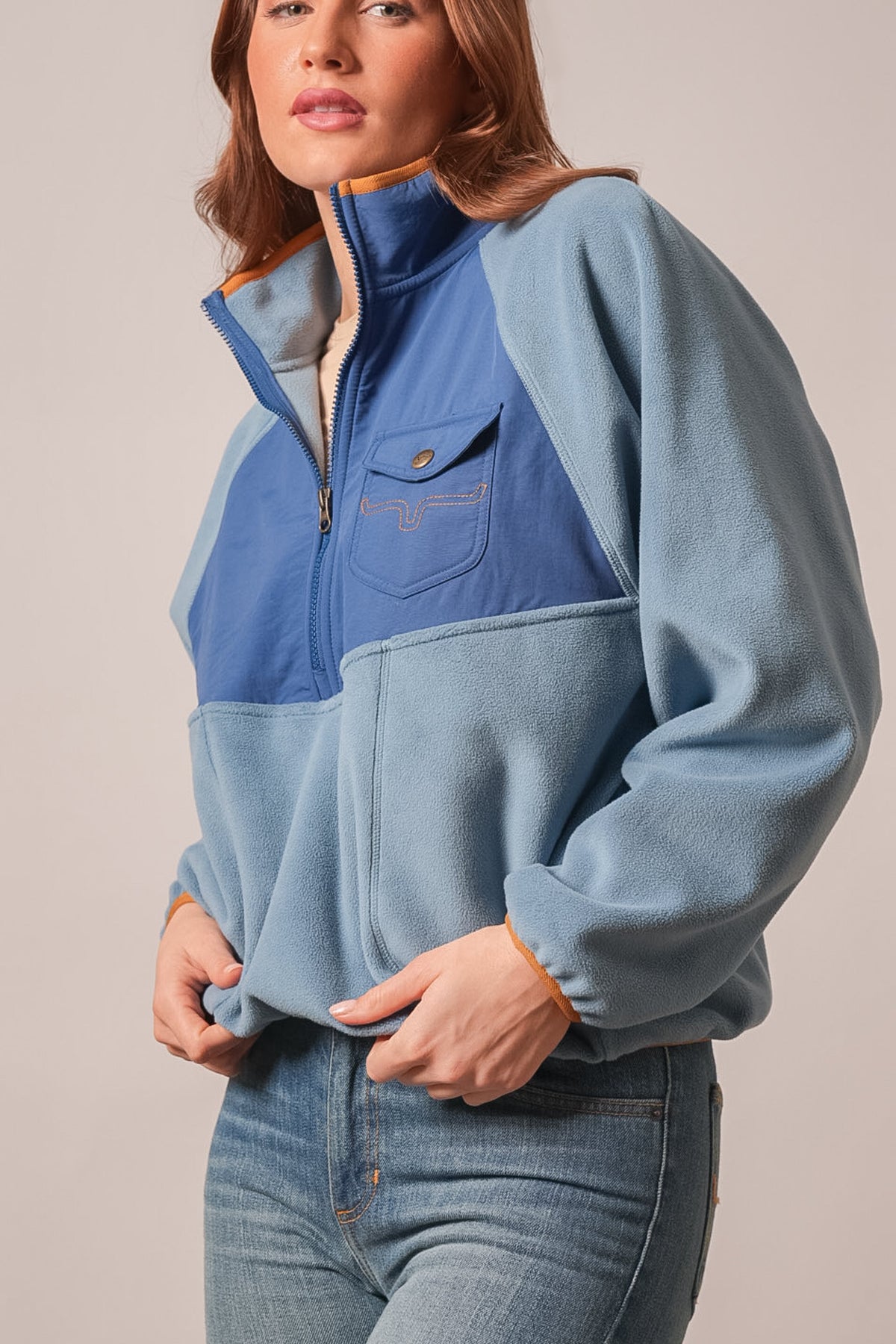 Kimes Ranch Indie sweatshirt, blue colourblocked fleece quarter zip, stand collar, chest pocket with logo