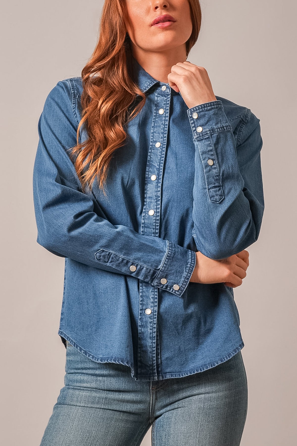 Kimes Ranch Lolo long sleeve button-front chambray top in indigo with pointed collar, chest pockets and rolled cuffs