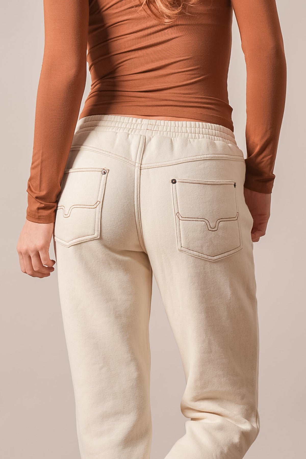 Kimes Ranch Page pants in Natural featuring an elastic waist and back pockets with curved stitching
