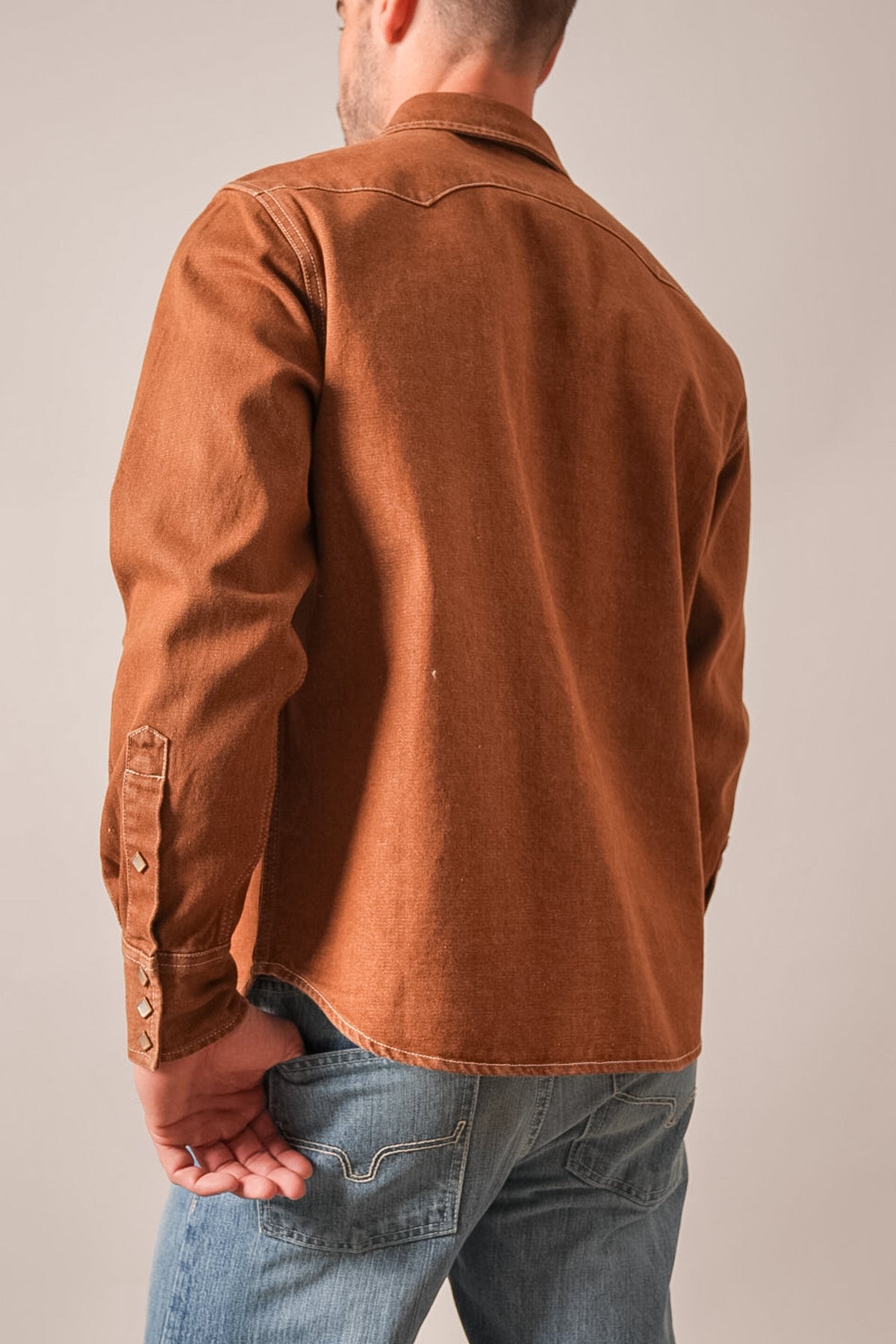 Kimes Ranch Roscoe jacket brown, back view, long sleeve with snap cuffs and contrasting stitching on yoke