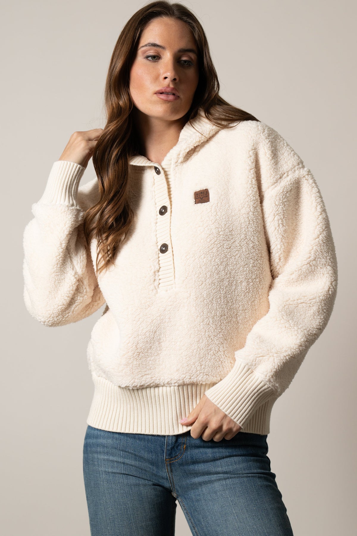Kimes Ranch Shayla Natural sherpa hoodie with Kimes Ranch logo, ribbed trim, three-button placket, kangaroo pocket