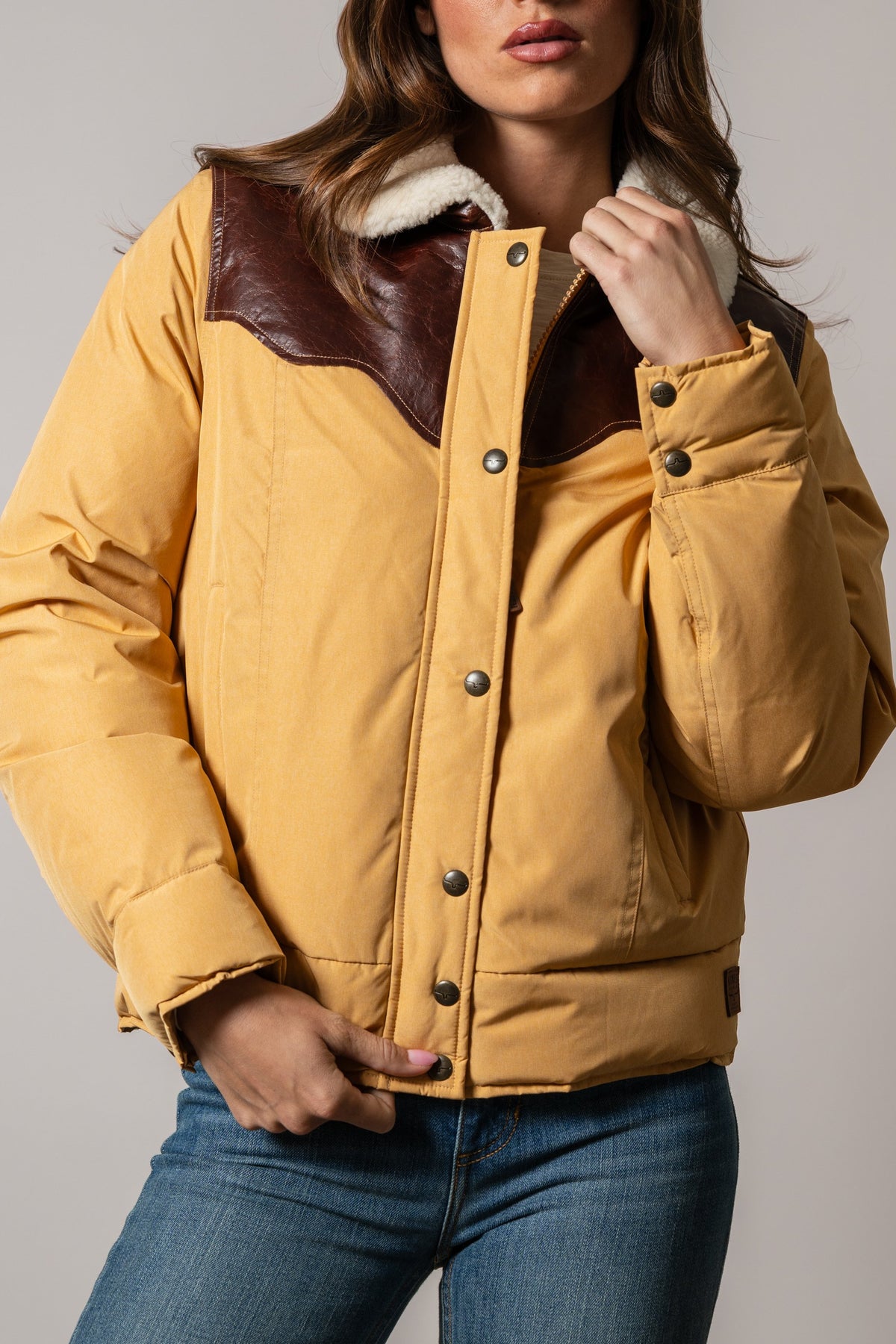 Kimes Ranch Sierra jacket in Coffee with brown leather shoulders and sherpa collar, front snap closure