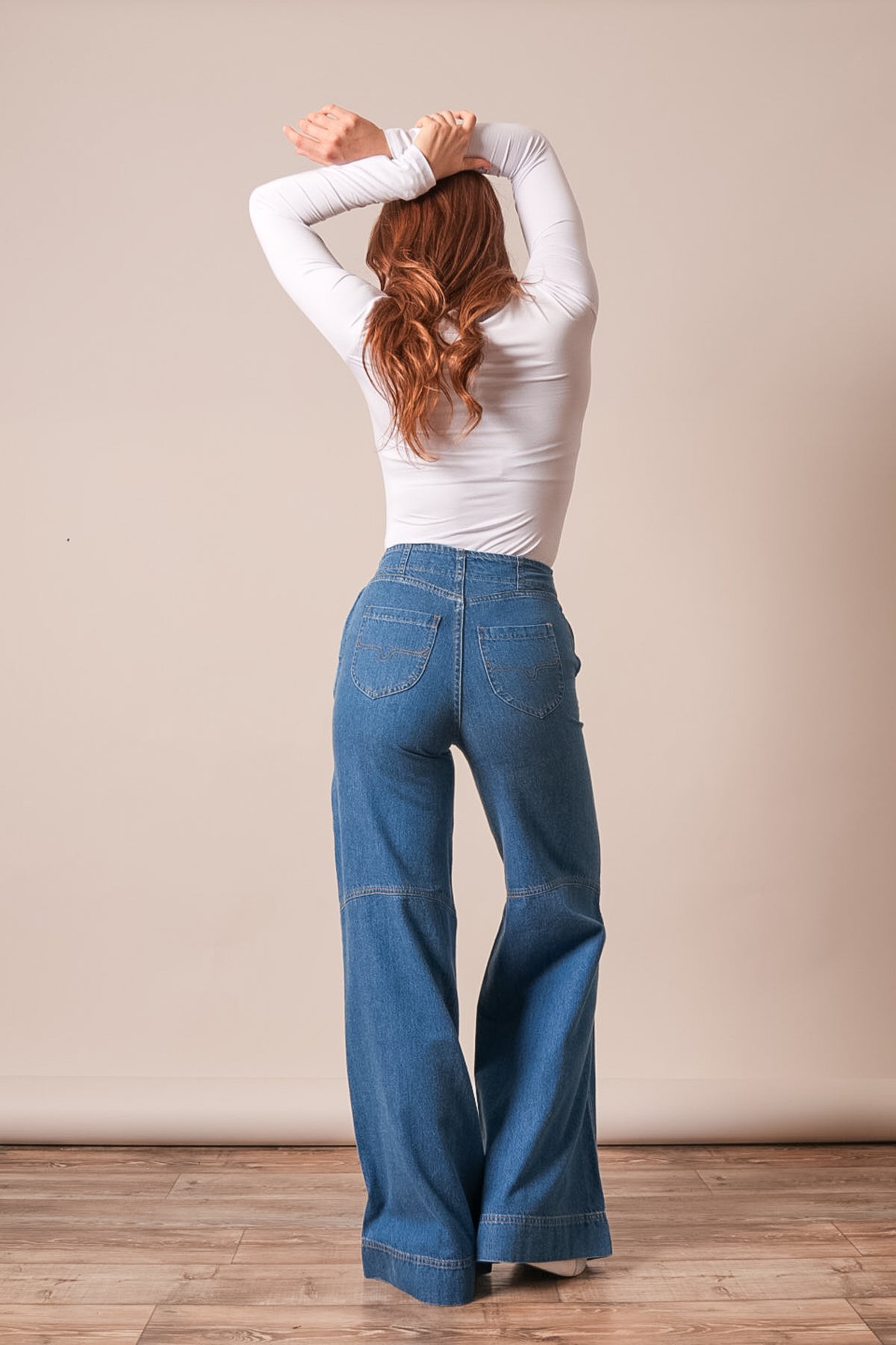 Kimes Ranch Sofie jeans in indigo, showing high-waist wide-leg fit and back pockets