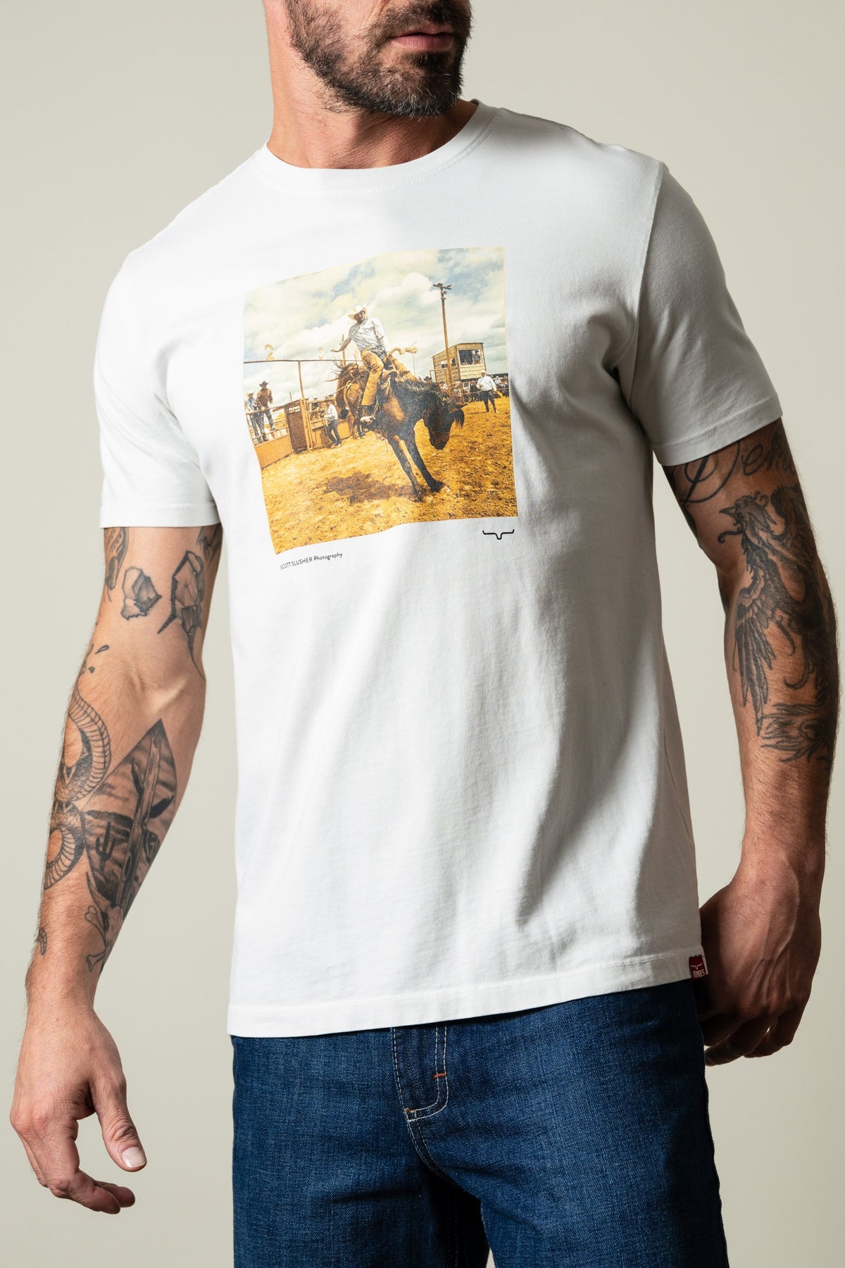 Kimes Ranch SS Classic Event white short sleeve tee with graphic of cowboy on bucking horse; #color_natural