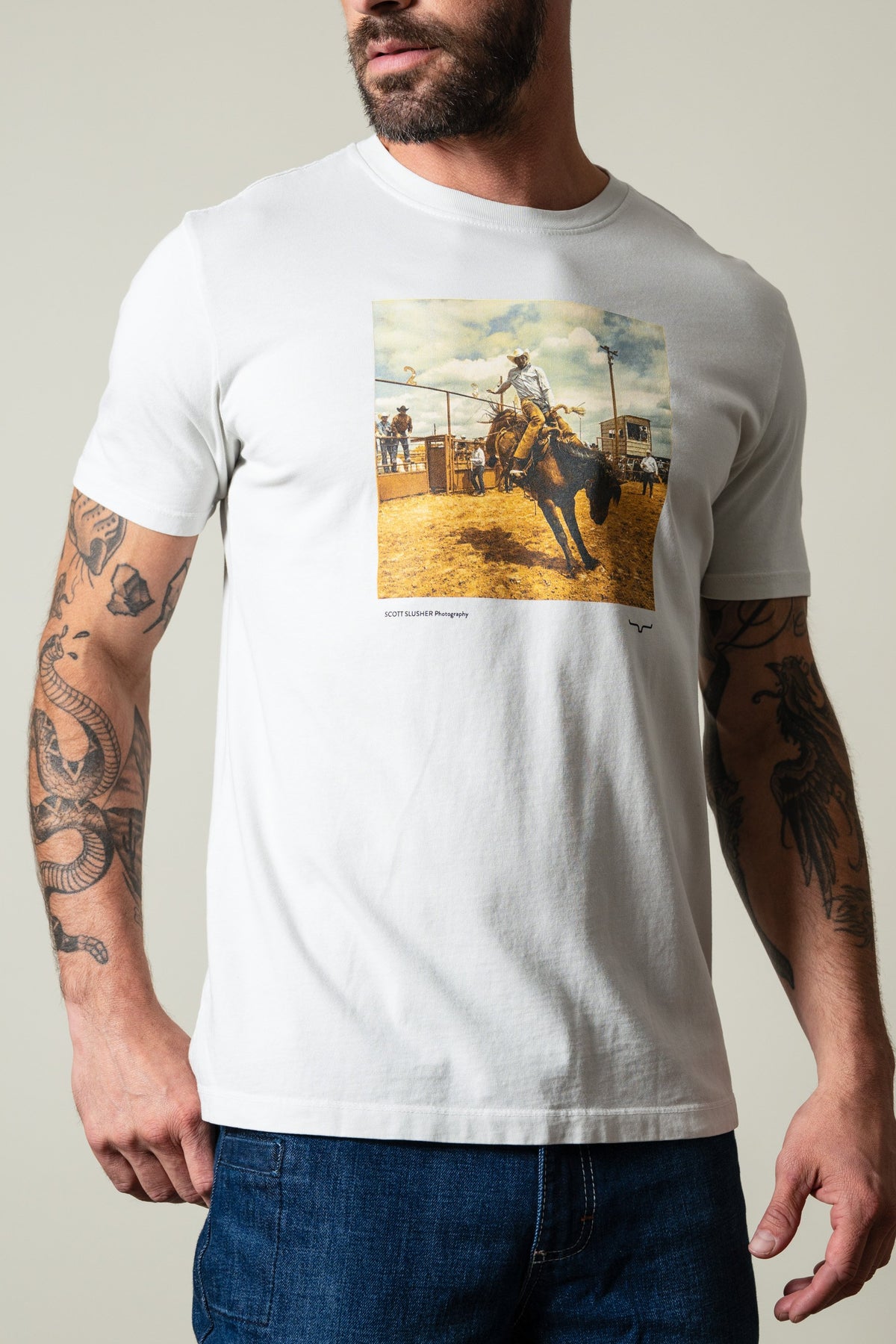 Kimes Ranch SS Classic Event short sleeve t-shirt in natural with a rodeo graphic and Scott Slusher Photography text; #color_natural