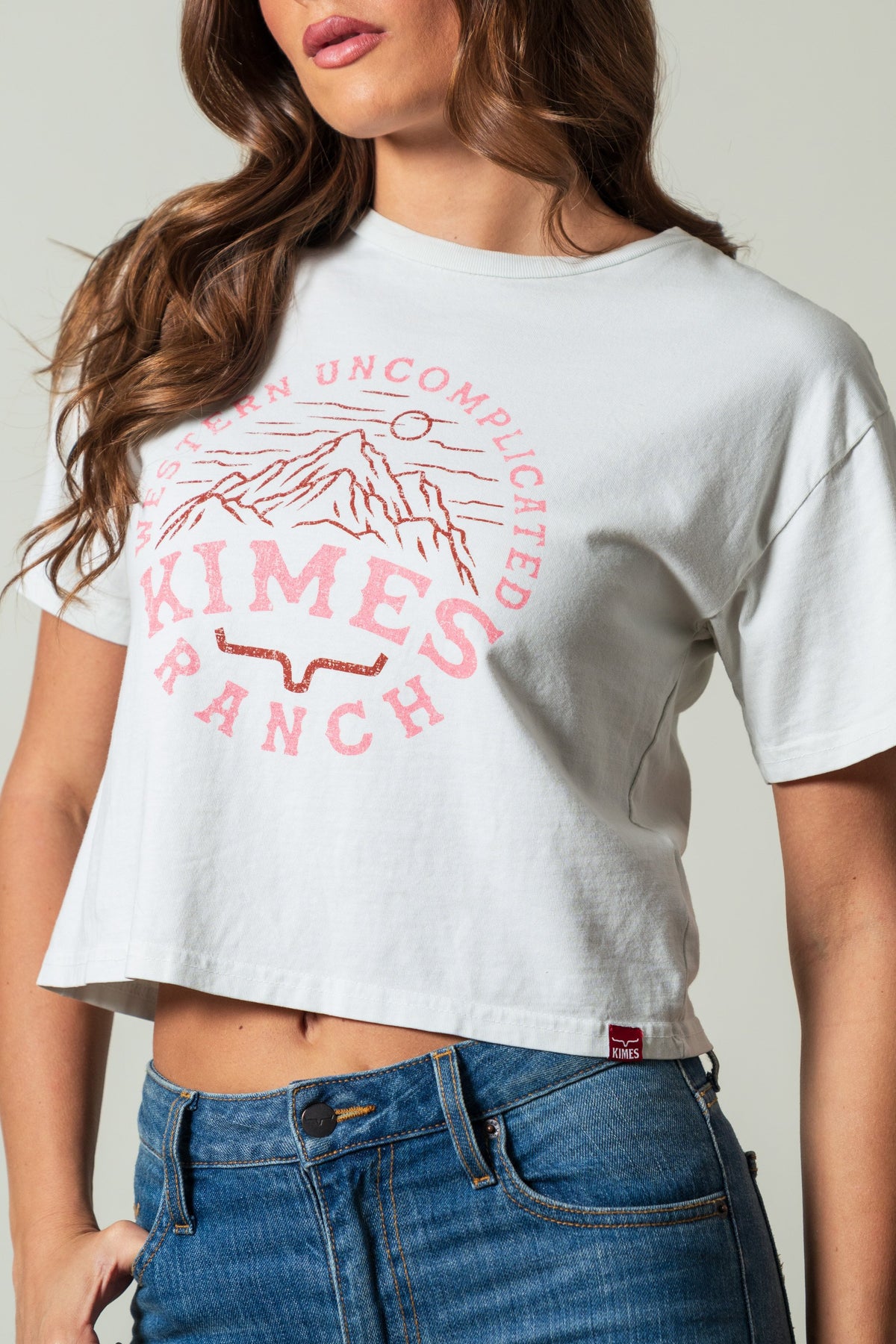 Kimes Ranch The Pass crop tee in natural with a pink graphic of mountains, Western Uncomplicated Kimes Ranch; #color_natural