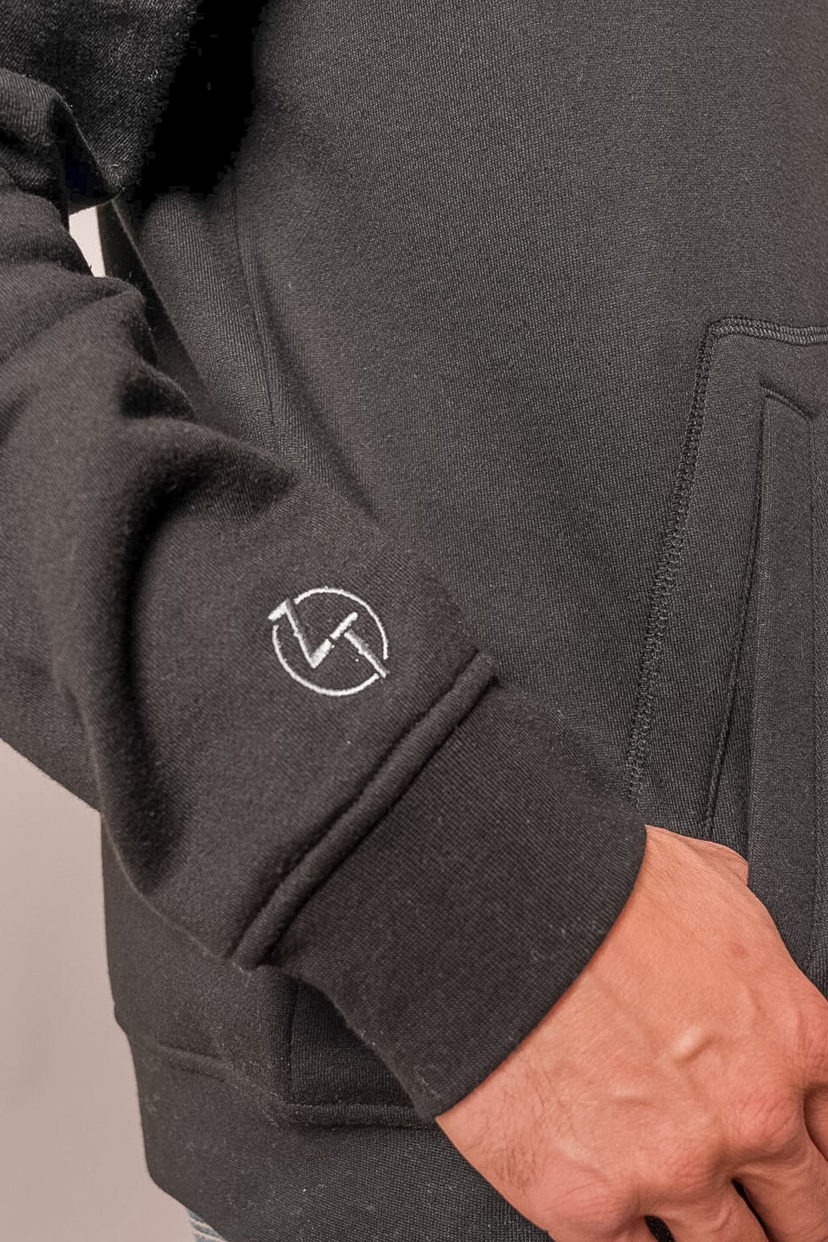 Kimes Ranch ZT Par Three sweatshirt, black, showing white logo on the cuff