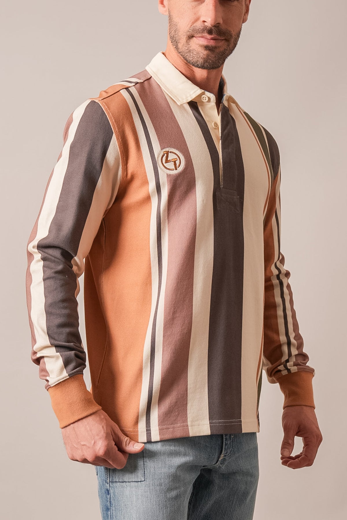 Kimes Ranch ZT Wyatt long sleeve polo in Espresso colorway, featuring vertical stripes and an embroidered Kimes Ranch logo
