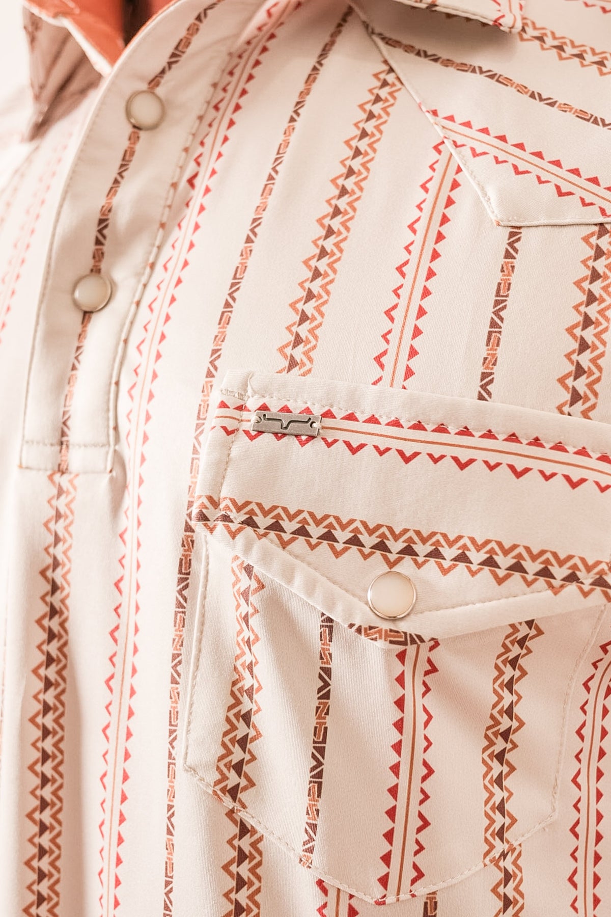 Kimes Ranch ZT Z-Stripe polo in Natural with red and brown geometric vertical stripes and snap-button chest pocket