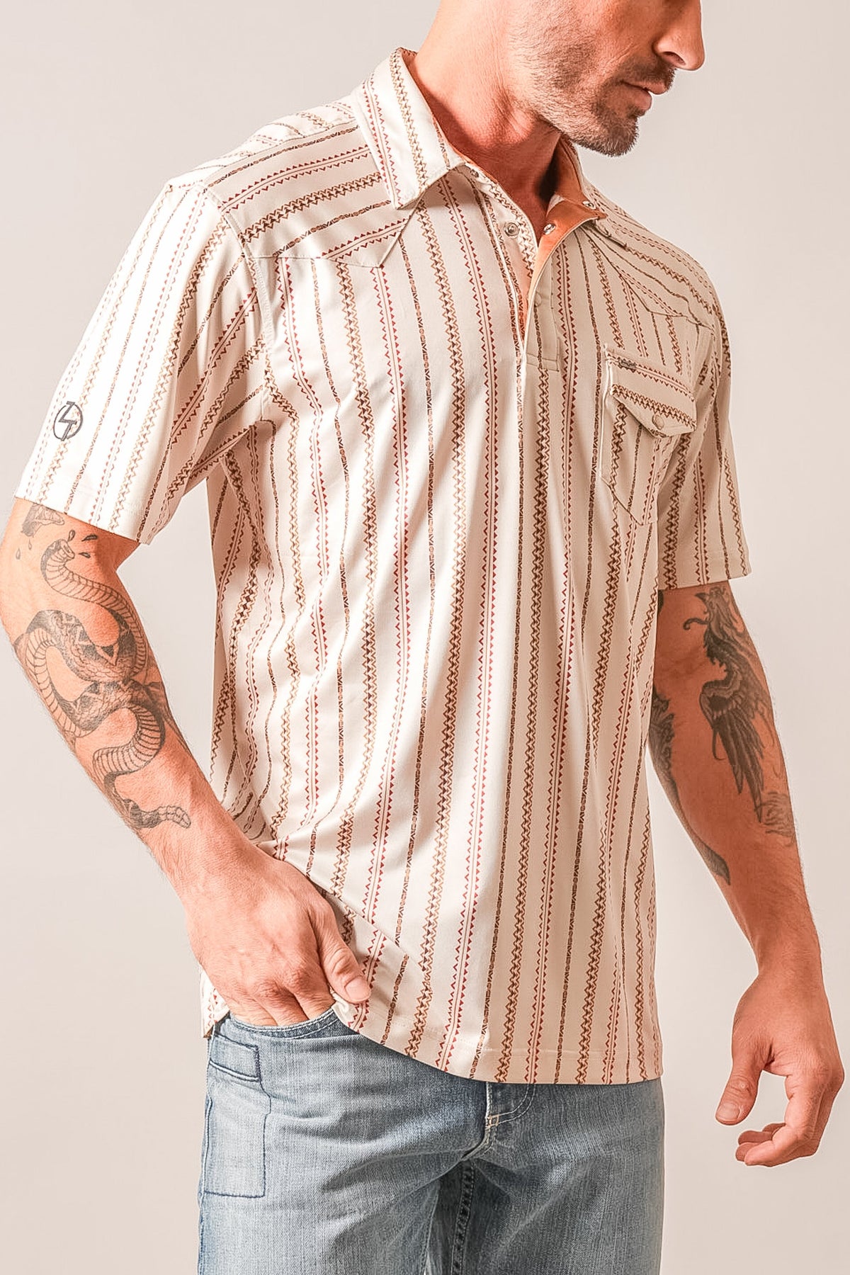 Kimes Ranch ZT Z-Stripe short-sleeve polo in Natural with vertical zigzag stripes and a left chest pocket